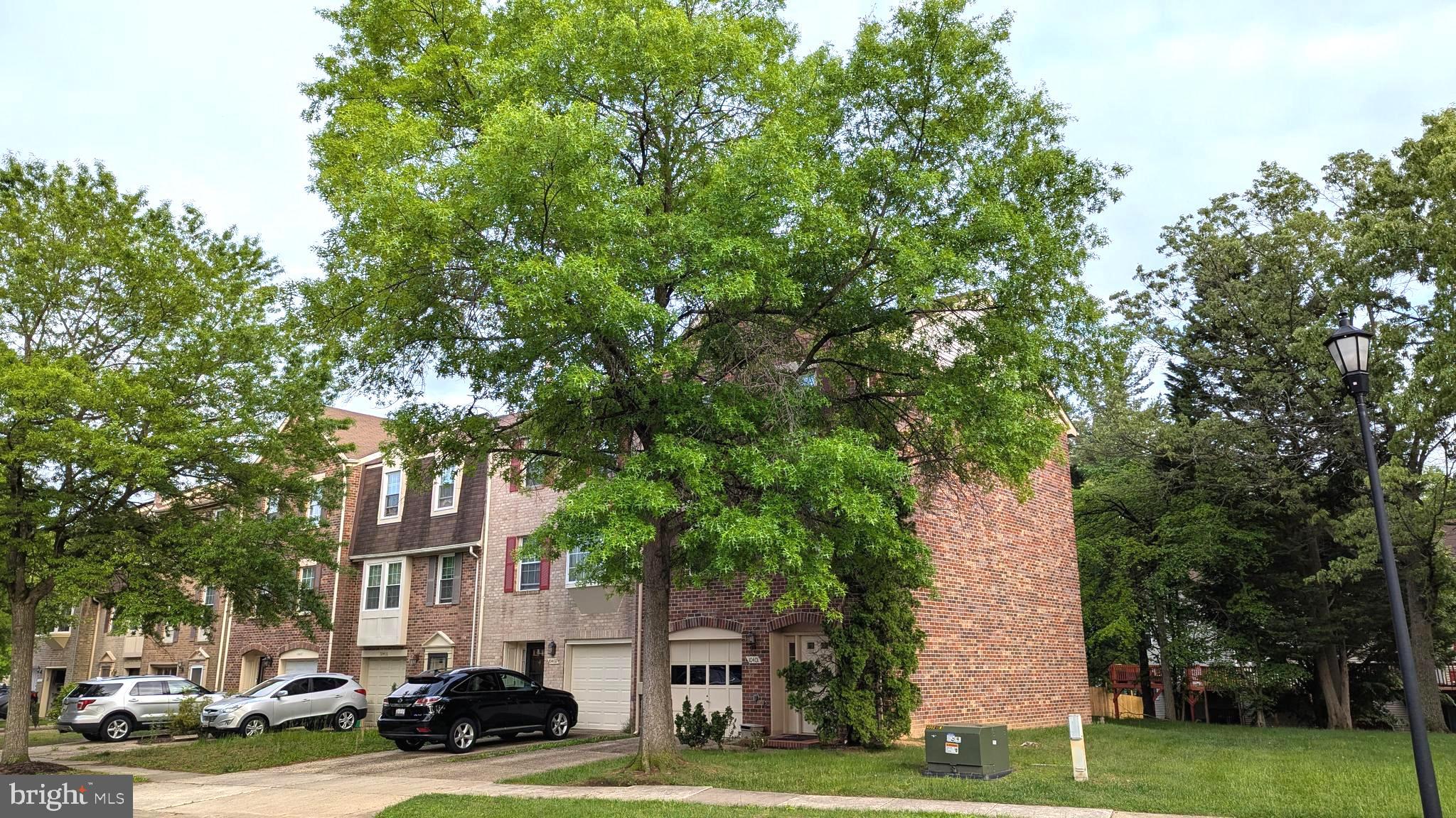 Welcome to this stunning and spacious brick end-unit garage townhome located in a sought-after Lanham community. This well-maintained 3-bedroom, 3.5-bath property offers over 2,400 square feet of comfortable living space, ideal for those seeking style, space, and convenience.
Featuring gleaming hardwood floors, a bright and open living/dining area, and a cozy fireplace, perfect for gatherings or quiet nights in. The modern kitchen includes ample cabinetry and connects seamlessly to a large deck—great for outdoor dining or relaxation.
Upstairs, you’ll find three bedrooms, including a spacious primary suite with an en-suite bath and excellent closet space. The lower level includes a large rec room, a full bathroom, and access to the backyard, offering flexibility for guests, a home office, or additional living space.
Additional highlights:
•