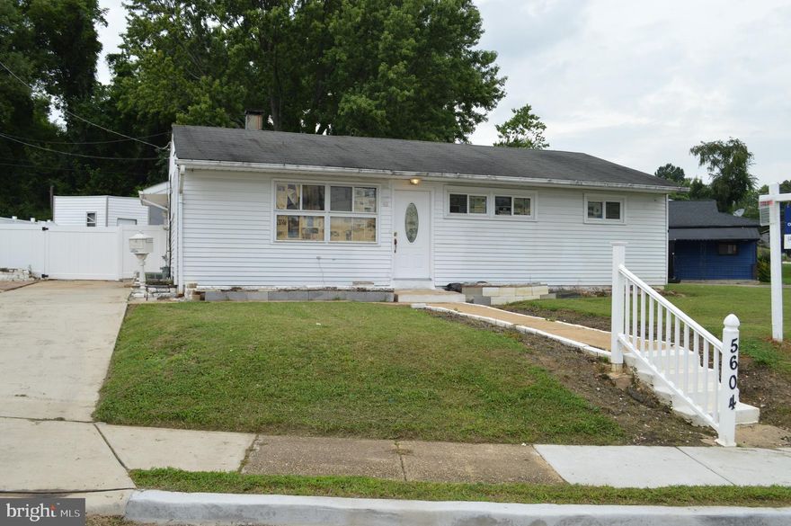 Great look from Hamilton Ave, with the driveway off the quiet Plainfield Ave.  Lots of space for off street parking and a gate to pull your car into the rear yard.  Front entrance off the lawn, or kitchen entrance off the driveway and rear yard entrance through sliding doors.  Open layout in this rancher, with the living room, dining area and kitchen, all blending together.   Three bedrooms and full bath gathered on the right side of the home.  Laundry area and utilities closet off the updated kitchen.  Dining area offers large sliding door to the rear yard.  Interior is all on one level and exterior has only a slight slope to this corner lot.
Both kitchen and bath were updated, but need to be completed by the next owner.