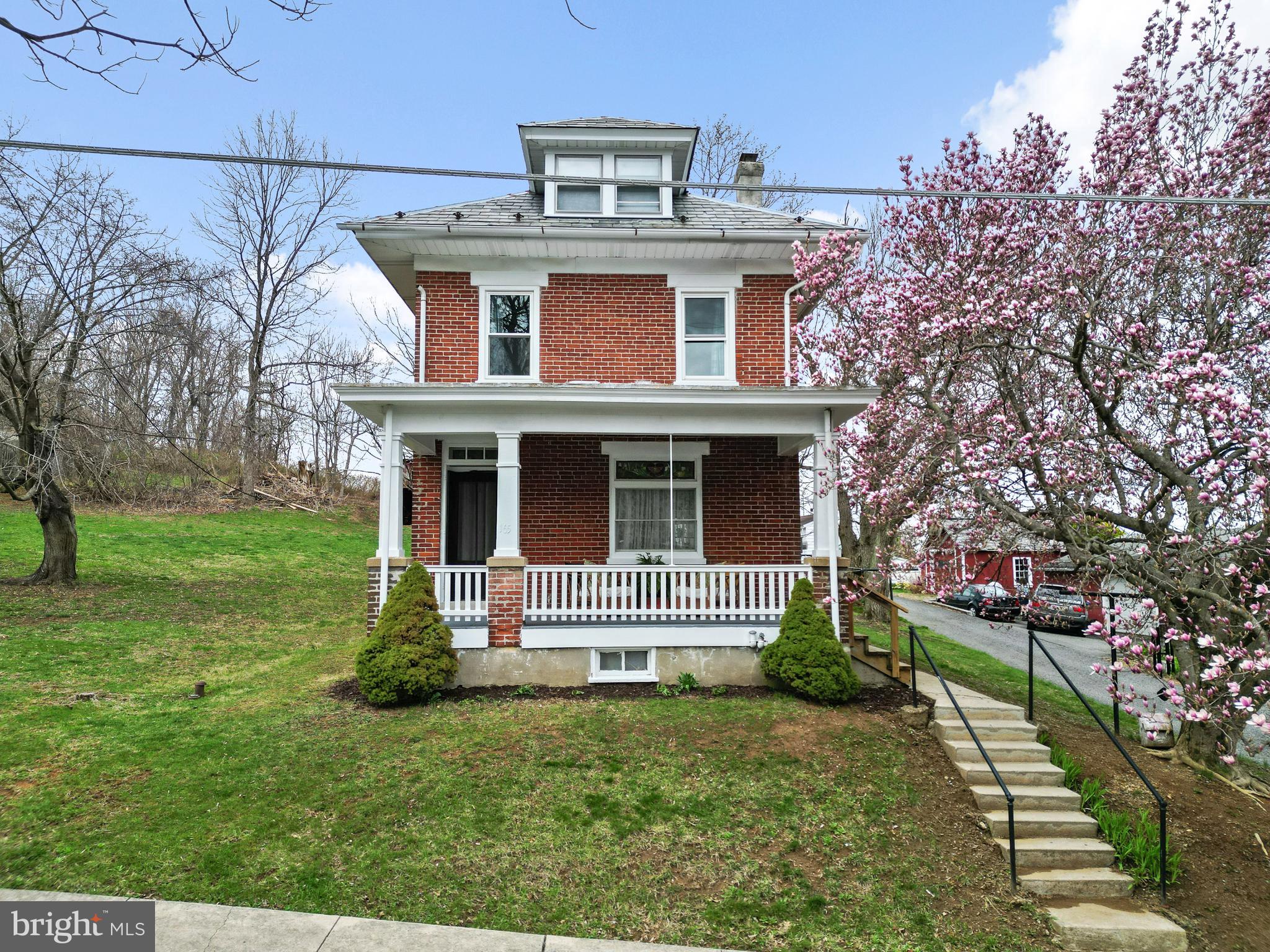 Welcome to 165 W Spring Street – A Beautifully Renovated Home with Endless Potential!
This charming detached home, renovated in 2019, offers the perfect blend of comfort and style. As you approach, you'll be greeted by a cozy front porch—ideal for unwinding with a glass of wine on warm summer nights or enjoying a peaceful cup of tea on crisp autumn mornings.
Step through the stunning restored front door and into the bright, airy living space. Gleaming hardwood floors guide you through the open family room and dining area, where tall windows allow an abundance of natural light to flood the space. The kitchen is a chef’s dream, featuring bamboo floors, sleek stainless steel appliances, butcher block counters, and soft-close cabinets and drawers.
Convenience meets style with a full bathroom located just off the kitchen, showcasing today’s most sought-after upgrades.
Upstairs, you'll find three spacious carpeted bedrooms and another beautifully updated full bathroom. The third floor boasts a finished space that can be used as a playroom, extra storage, or even an additional bedroom—endless possibilities!
The unfinished basement provides ample storage space and houses the laundry area and utilities, making it the perfect spot for a home gym or additional storage.
Outside, you'll fall in love with the expansive .40-acre double lot and a newly-roofed barn, which is perfect for storage, hobbies, or play. The property includes two parking spaces in the driveway, with plenty of additional on-street parking. Plus, rest easy knowing this home is NOT in a flood zone! New plumbing, new electric, new windows approx 6 years old!
Nestled in the heart of the borough, this home offers privacy and convenience with no worries of water issues. With so much to offer, this is a must-see! Don't miss out on this fantastic opportunity!