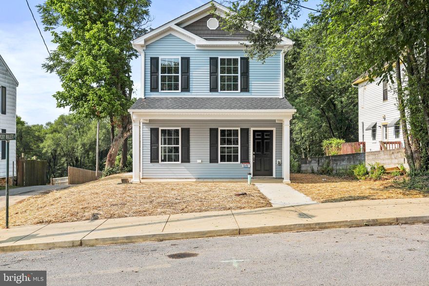 This beautiful home is new construction and the certificate of occupancy has been received. It is another beautiful masterpiece delivered by A&K Carpentry, LLC. Walk to everything if needed. Be a part of the revitalization of our Historic Martinsburg, while buying a modern home in a historic district. Beautiful front porch to blend with history while inside offering all the modern needs and requirements. Also a 2 car garage for convenience and a very nice back yard for bbqs, play sets, gardens whatever your heart desires. Bring your family, pet and call this beauty home. It is also priced perfectly for those who need more of a yard than what a town home would offer.  You cannot purchase a townhome with these amenities and square footage for this price with all the conveniences this home offers. Hurry and come and get her.