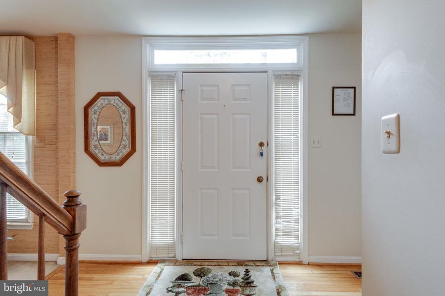 Welcome Home!!!  Looking for space, this home has it.  Owner has maintained this home exceptionally.  Large at home living.  Open concept for major  gatherings.  Excellent outdoor space for entertainment.  Excellent Trex composite deck with Stone Patio.  very convenient shed located out back. Fully enclosed porch.  Large flat backyard with extensive upgraded landscaping, exterior lighting, circular driveway.  Large addition done 2007 increasing kitchen and sunroom.  Huge gourmet kitchen overseeing the living room, granite counters, stainless appliances, upgraded cabinets,  2 LARGE pantry, large island with built in storage and wine cooler, hardwood floors & skylights!! LOTS of natural lighting through the house. Lots of storage space.  All bathrooms have been updated.   Dual zone heating.  Intercom system throughout the house.  Turn key ready for immediate move in.  Fourth room upstairs easily converts back to bedroom once adding closet.  Basement half bath has lots of space to make a full bathroom.   Perfectly located in Fairfax close to schools, shopping, public transportation, major highways, Dulles Airport, route 28 and 267, Silver Line Metro, Reston Town Center, Downtown Herndon. No HOA fees!