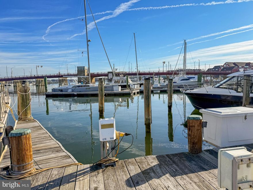 Boating season is just around the corner—embrace the maritime lifestyle with your very own  waterfront slip at 319 6th Street, Annapolis, MD 21403. Boat size is limited to 34' length overall.  Situated in the heart of Eastport, this sought-after marina places you in the Sailing Capital of the World, where boating isn’t just a pastime—it’s a way of life. Beyond the convenience of docking in a prime location, this slip comes with access to resort-style amenities, including a sparkling pool, fitness center, sauna, game and billiards room, and a party space for gathering with fellow boaters. One of the few marinas in Annapolis that allows liveaboards, this is the perfect opportunity for those looking to fully immerse themselves in the vibrant waterfront culture. With two gated parking spaces and easy in-and-out slip access, you'll enjoy seamless transitions from land to sea. Walk to downtown Annapolis, world-class yacht clubs, sailing schools, waterfront dining, and boutique shops, all while being part of a community that thrives on the water. Whether you’re setting sail for an adventure, cruising the Chesapeake, or simply soaking in the stunning harbor views, this slip offers a front-row seat to the best of Annapolis, including the iconic Eastport Lights Parade. Don’t just dock—live the Annapolis boating lifestyle year-round! (Contract will be contingent for 15 days as Condo bylaws require 15-day right of refusal to other unit owners-see disclosures. )