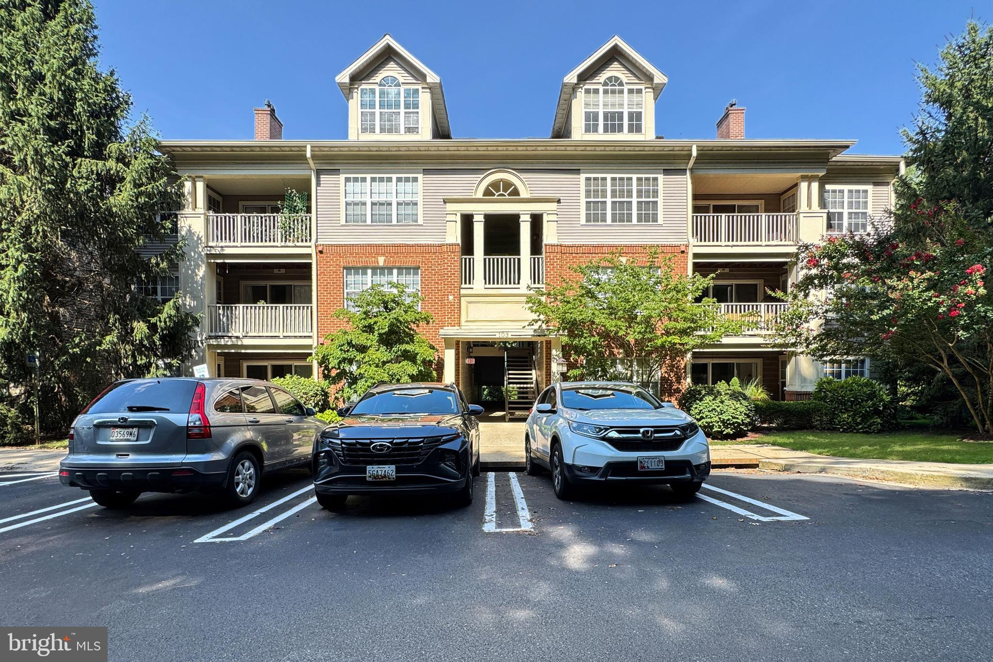 Discover effortless living at 103 Timberbrook Lane, Unit 104 – a stylish and accessible first-floor condo nestled in the vibrant heart of Gaithersburg, Maryland. This beautifully updated 2-bedroom, 2-bathroom residence offers 1,177 square feet of thoughtfully curated living space, combining comfort, convenience, and modern design. With no stairs required for entry or exit, this home is perfectly suited for buyers seeking a low-maintenance lifestyle with enhanced accessibility.
Step inside to a bright and open floor plan that seamlessly connects the spacious living area to a gourmet kitchen, complete with granite countertops, ample cabinetry, and updated lighting—ideal for both casual meals and elegant entertaining. Enjoy tranquil wooded views from your private patio, a peaceful retreat that benefits from abundant natural light thanks to its southwest exposure—with gentle morning sun gracing the guest bedroom. The primary suite is a true haven, featuring a walk-in closet with upgraded lighting and a well-appointed en-suite bath. The second bedroom offers flexible space for guests, a home office, or creative pursuits.
Situated in a quiet, well-maintained building with easy parking lot access, this home is just minutes from the lively Crown and Rio centers, where lakeside dining, boutique shopping, and entertainment await. Whether you're a first-time buyer, a savvy investor, or simply looking to downsize without compromise, this turnkey home offers the ideal blend of location, lifestyle, and livability. Don't miss your chance to make this move-in-ready gem your own. Schedule your private showing today.