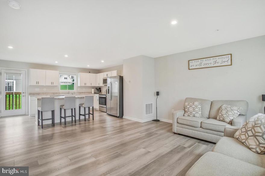 Virtual tour available - just click the link! New to the market, you will love this NVR Cedar Model features an open floor plan, half bath and bonus room that would be perfect as work from home space, library, play room or office.  on the upper level you will find 4 generous sized bedrooms, walk-in closets, two full baths, a sitting area at the top of staircase and laundry room with storage.  The lovely home has custom blinds, a nice yard for entertaining, low HOA fees and an adorable front porch.  The unfinished lower level offers a blank pallet to truly make this space your very own!  In your two garage you will appreciate the overhead storage with direct access to the dining/kitchen areas.  You won't be disappointed, this lovely home is exactly what you have been waiting for.  Contact your agent today to be the first to see this or attend the open house  on Sunday, October 6th, 12 noon to 2pm!