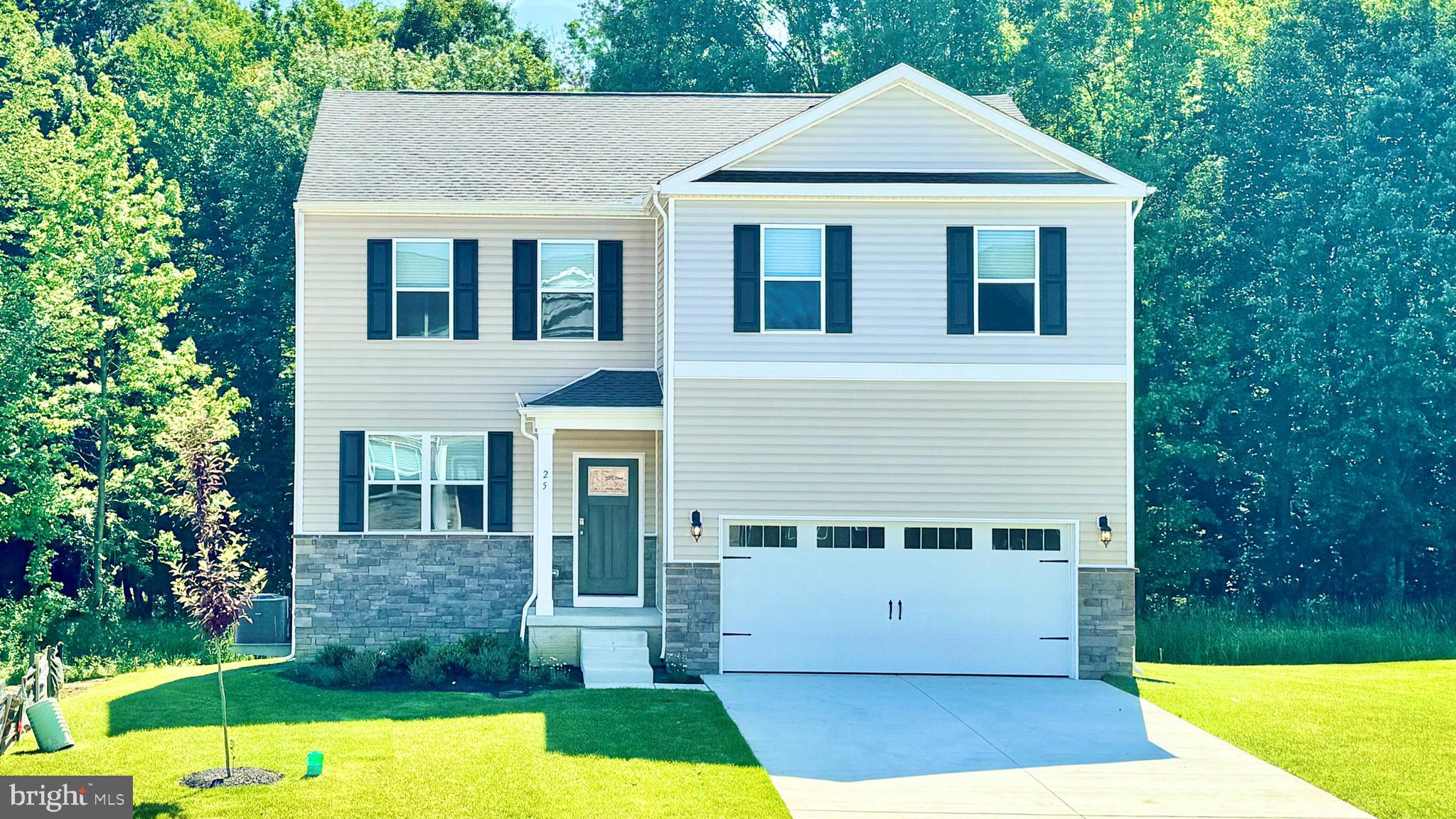 Explore 55 Buttercup Circle, a new home under construction in Elkton, MD in the Barksdale Crossing community. This 2,969 square foot two-story home offers five bedrooms, three and a half bathrooms, a flex room, 9’ ceilings, and a two-car garage.
This well-designed home has an inviting foyer that is open to the functional flex room that can be used as an office, playroom, or formal dining space. The functional kitchen features modern gray cabinetry, beautiful quartz countertops, an oversized corner pantry, a spacious island with additional room for seating, and stainless-steel appliances. The kitchen flows seamlessly into the dining space and the sizeable great room. The first floor also offers a powder room, coat closet, and storage area.
As you make your way up the stairs that are nestled in the corner of the great room you will find a vast landing. The impressive owner’s suite boasts an expansive bedroom, a huge walk-in closet, and a contemporary owner’s bathroom with a large shower. Three generously sized secondary bedrooms, a spacious hall bathroom with double vanity, and the conveniently located laundry room complete the upstairs.
This home includes a finished basement with a recreation room, bedroom, and bathroom. The Galen also includes white window treatments, an upgraded interior trim package, a fully sodded, irrigated, and landscaped yard, and the exclusive Smart Home® Package through ADT giving you complete peace of mind living in your new home.
Pictures, artist renderings, photographs, colors, features, and sizes are for illustration purposes only and will vary from the homes as built. Image representative of plan only and may vary as built. Images are of model home and include custom design features that may not be available in other homes. Furnishings and decorative items not included with home purchase.