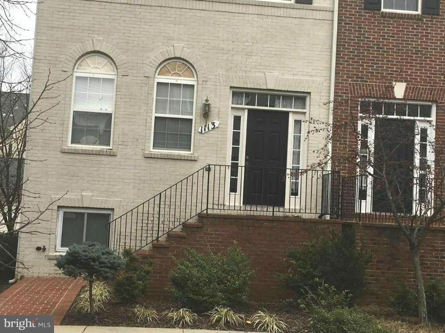 LOCATION. Spectacular large 3 BR end unit townhouse. Hardwood floor, no carpet, 9' ceiling, beautiful large kitchen w/table space and island/breakfast bar, balcony/deck w/sliding doors off kitchen, large living & dining room W/fireplace faces to LR and kitchen., luxurious MB w/soaking tub, basement w/half bath, Easy access to 355,270,370,200, shopping, FREE shuttle to metro.