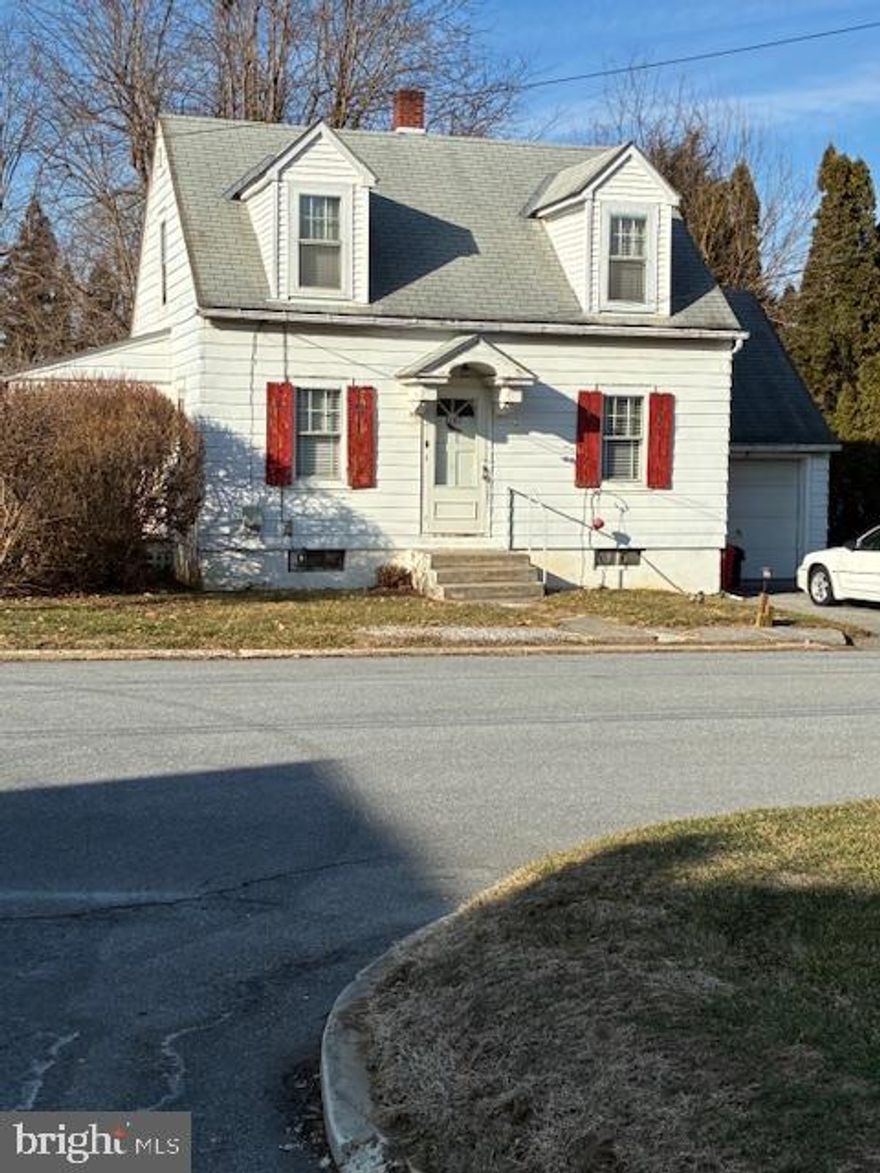 COZY SOUTH SIDE CAPE COD THAT HAS GOOD BONES BUT NEEDS UPDATING.  IT FEATURES 3 BEDROOMS, 1 FULL & 1 HALF BATHS, LIVING ROOM, KITCHEN & DINING ROOM.  HARDWOOD FLOORS AND THERE IS A NICE SIZE LAUNDRY ROOM, WITH A LAUNDRY TUB, BUT NOT A WASHER & DRYER HOOK-UP.  FURNACE INSTALLED 2023 & FEATURES OIL HOT WATER CAST IRON BASEBOARD & RADIATOR HEAT.  WELL WATER WITH WATER CONDITIONER SYSTEM & PUBLIC SEWER.  10X12 REAR CONCRETE PATIO.  THE ROOF COVERED SIDE PORCH FLOOR NEEDS REPAIR.