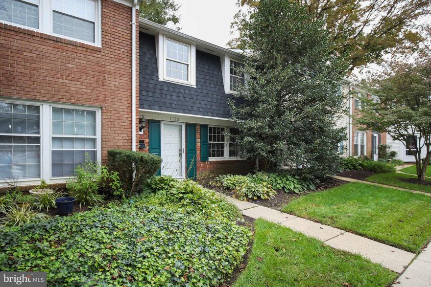 Beautiful townhome just off the Parkway.  Updated and remodeled kitchen and baths.  Hardwood floors.   Wood burning fireplace. Huge bedrooms.  Enjoy cookouts in the backyard with all brick patio area.  Windows  replaced around 2007.  Roof and wood sheathing replaced September 2020.  This home shows very well!