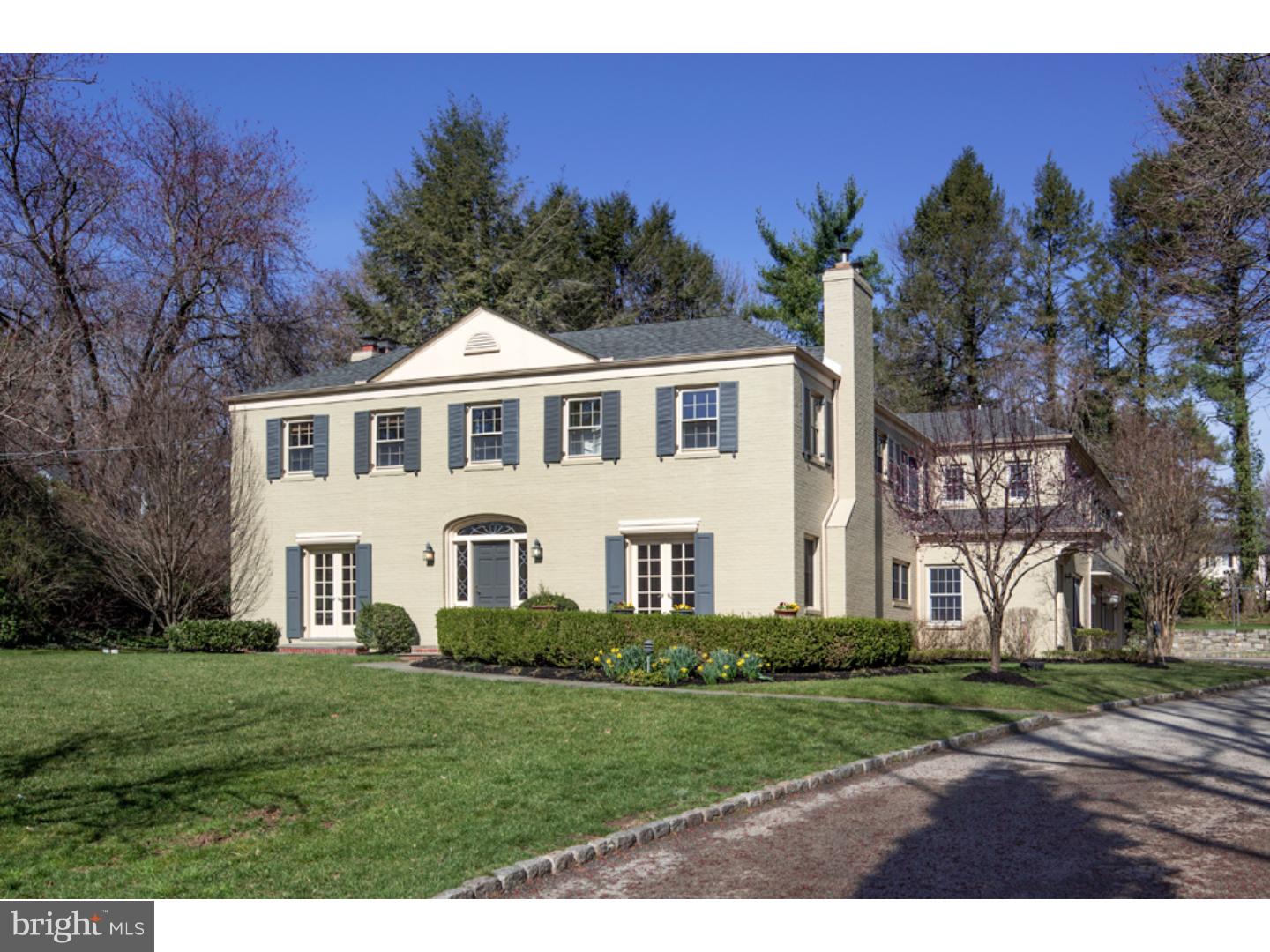 The epitome of elegance & family living, in the heart of Bryn Mawr. Breathtaking, this exquisitely-detailed 6 BR 6.5 bath Center Hall brick Colonial sits on pristine property near shops, restaurants, the train & transportation. The sought-after family-friendly neighborhood is well established with long-time residents. A handsome brick wall with piers framing the entry sets a sophisticated tone & gives way to a Belgian block-lined drive. Two curb cut entrances on Fishers & Shipton ease accessibility. A flagstone walk leads to the family & main entrances of this tastefully painted brick estate that welcomes large crowds! Whether you have a big family, love entertaining or hosting your friends, this inviting home accommodates all. The parklike exterior presents stone walls installed by notable architect Ann Walters that define & beautify the seating areas in the rear grounds. The expansive interior was thoughtfully reconfigured by respected architect Pete Batchelor who opened the space to create a seamless flow. This included expanding the kitchen into the breakfast room, now a favorite gathering place for the cook & family. Meals are inspired in this ultimate chef's setting graced by Brookhaven cabinetry, granite counters, stainless appliances & a center dining island. There's no better place for morning fare than the coffered ceiling breakfast room with French doors to the rear flagstone terrace. Enjoy formal meals in the dining room with a fireplace, crown/chair rail moldings & French doors to the front grounds. A spacious living room with oak flooring, a fireplace, built-ins & French doors facing front proceeds into the vaulted ceiling family room brightened by skylights, with built-ins, a fireplace plus double sets of doors to the terrace. The library showcasing custom cabinetry, wainscoting, a workstation & walls of bookcases & quiet home office with abundant Halkett custom cabinetry found elsewhere throughout the home provide peacefulness for reading, work & study. Perched on level 2 awaits your serene master suite featuring a fireplace, fitted walk-in closet, & spa-quality bath with a soaking tub, frameless glass shower & double-sink vanity. Bedrooms 2 & 3 share a full bath; all other BRs are en-suite, with #6 rivaling the size of any master for long, comfortable stays. A convenient mud room, fully-equipped laundry room, 3-car garage, lower level with a rec room, bonus room, bathroom with shower & unfinished area complete the list of amenities!