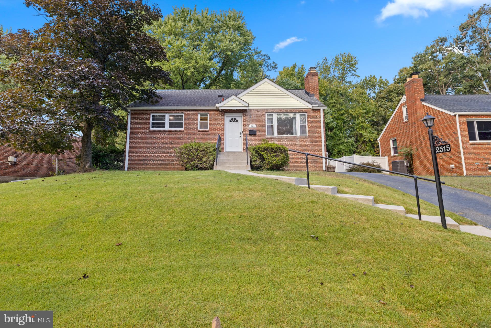 Welcome to 2515 Lime Street – a beautifully updated, all-brick home located in the commuter-friendly North Barnaby neighborhood of Temple Hills. This spacious and versatile residence offers a thoughtful blend of charm, convenience, and modern upgrades, perfect for today’s homeowner. Enjoy peace of mind with recent upgrades that include a new hot water heater, EV electrical outlet at the driveway, and upgraded appliances including refrigerator, stove, dishwasher, washer, and dryer. The roof, flooring, and more have also been recently improved for added value and comfort. Step into the inviting living room featuring a cozy fireplace that flows seamlessly into the light-filled dining room—ideal for hosting and entertaining. The updated kitchen is equipped with stainless steel appliances, decorative backsplash, and ample cabinetry. The main level offers three spacious bedrooms with hardwood floors and a full bath. Upstairs, you'll find a newly finished fourth bedroom—perfect as a guest room, home office, or creative space. The lower level features a large family room, second full bath, laundry area, and potential for a fifth bedroom perfect for multi-generational living. Outside, enjoy summer BBQs on the rear deck overlooking a generous backyard. The extended driveway offers plenty of parking, and secure storage adds everyday convenience. Located just minutes from public transportation, grocery stores, Tanger Outlets, MGM Casino Resort, and National Harbor. Commuting is a breeze with quick access to Rt. 295, the Woodrow Wilson Bridge, and the D.C./MD/VA corridor.
