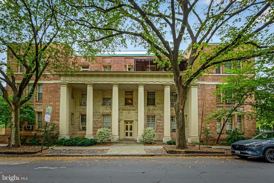 Welcome! Charm prevails in this 2nd floor spacious and gracious prewar condominium building with high ceilings, crown molding, three walk-in closets, large flowing  rooms that allow sit down meals of upwards of 30 people, and exquisite architecture. Sconces and recessed lighting have been added. Magnificent covered porch for Wordle, Sunday New York Times or Al Fresco dining * Hardwood floors * Arched doorways * Sun drenched * Updated kitchen with custom cabinetry  * New washer & dryer * Entry hall * Generous room proportions * Additional storage in basement * Beautifully arbored street in the heart of heart of Tuscany Canterbury * Community garden * Close proximity to eateries, Schools, Baltimore museum of art * Easy to enjoy!