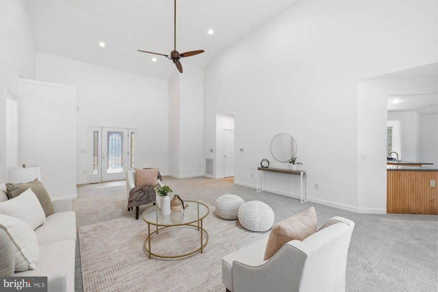 Tucked away on over 3 private acres in the heart of Churchton, this beautifully designed one-level rambler offers the perfect blend of space, comfort, and quiet living. With a private paved driveway, attached 2-car garage, and charming covered front and back porches, this property invites you to slow down and enjoy Eastern Shore–style serenity while still being convenient to everything Anne Arundel County has to offer.

Inside, the modern open layout connects the kitchen, dining, and main living areas seamlessly — ideal for entertaining or everyday living. The spacious kitchen features ample cabinetry, a pantry, and flows effortlessly into the heart of the home. A second living room with a cozy fireplace creates the perfect flex space for relaxing or hosting guests.

The thoughtfully designed floor plan includes a bonus study/home office, a dedicated laundry room, and two generously sized secondary bedrooms connected by a full bath. The standout owner’s suite is a true retreat — complete with an oversized walk-in closet and a private spa-like bath featuring a jacuzzi soaking tub and separate shower.

Enjoy peaceful, private living in one of Anne Arundel County’s best kept secrets — Churchton — known for its quiet lifestyle, excellent schools, and close proximity to waterfront dining, marinas, and commuter routes. Space. Privacy. One-level living. This one checks all the boxes.