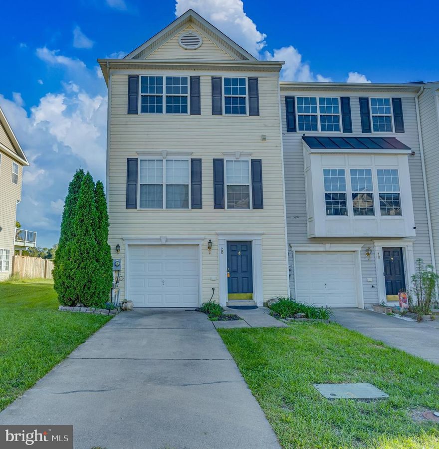 This move-in ready, end-unit townhome features 3 bedrooms, 2 full baths, and 2 half baths, with a new architectural shingle roof and outdoor HVAC unit installed in 2024. The finished lower level includes a cozy family room with a gas fireplace and french doors leading outside. The main level offers a bright living room with access to the deck which looks out to beautiful pasture, a dining area with hardwood floors, and a well-equipped kitchen with Corian countertops, black appliances, and a pantry. The upper level boasts a spacious primary suite with vaulted ceilings, a walk-in closet, and a luxurious bath featuring double sinks, a separate shower, and a soaking tub. Two additional bedrooms and a full bath complete the upper level. Natural gas, an attached garage, and some new flooring add to the home’s appeal. Ideally located just minutes from I-81, this is a perfect home for commuters.