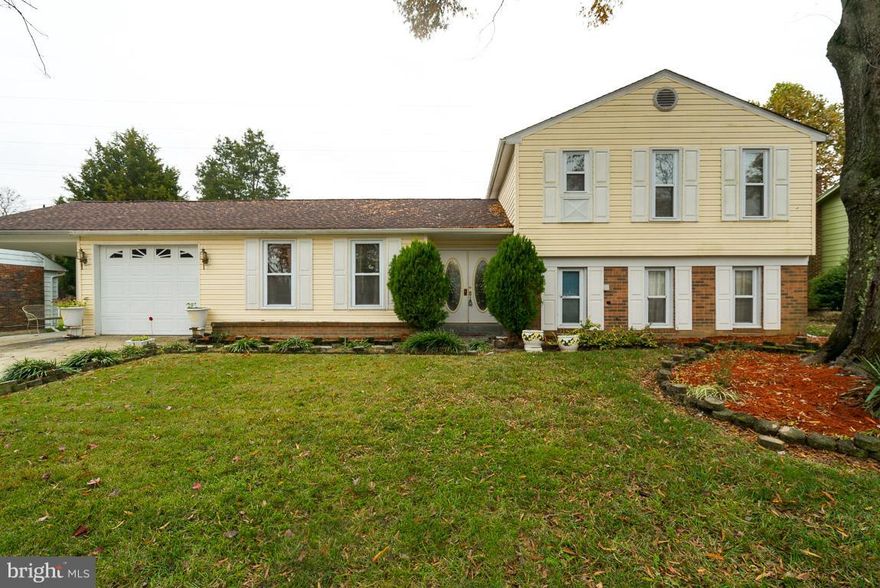 Conveniently located 4 bedroom home! This nice 4 bedroom/3 bath home has hardwood floors on the main level, kitchen with granite counter tops and stainless steel appliances!  A long deck to entertain on and a pool!  Cozy fireplace in the family room, a carport and a garage too! Roof was replaced in 2016. This home is move in ready so come check it out today!