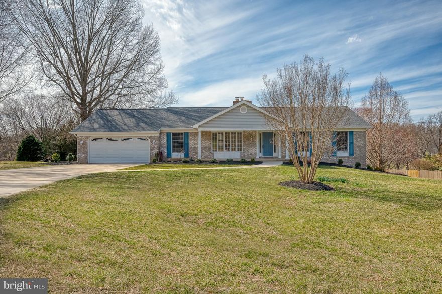 This is the home you have been waiting for! This stunning 2 car garage rancher on a small cul de sac is situated on a sprawling lot that backs to trees! This immaculate rancher has 4 bedrooms with a possible 5th bedroom/office in the lower level. Main floor features 3 bedrooms and 2 full baths, one of which is an ensuite with double sinks. The recently remodeled kitchen has quartz counters and beautiful upgraded cabinets. Off the kitchen the laundry/butler's pantry is a dream with a second sink, pantry closet, shelving, cubbies and front loading washer and dryer. The family room boasts a gas fireplace and plenty of windows overlooking the private backyard with access to the maintenance free deck. In the basement you will find a large light filled great room with a propane stove, 2 additional rooms with egress access, full bath with walk in shower and a kitchenette perfect for a bar and entertaining or an in law suite. This home is absolute perfection! Roof 2024, Well Tank 2025, new paint 2025 and much more! Thoughtfully updated and well maintained it won't last long!