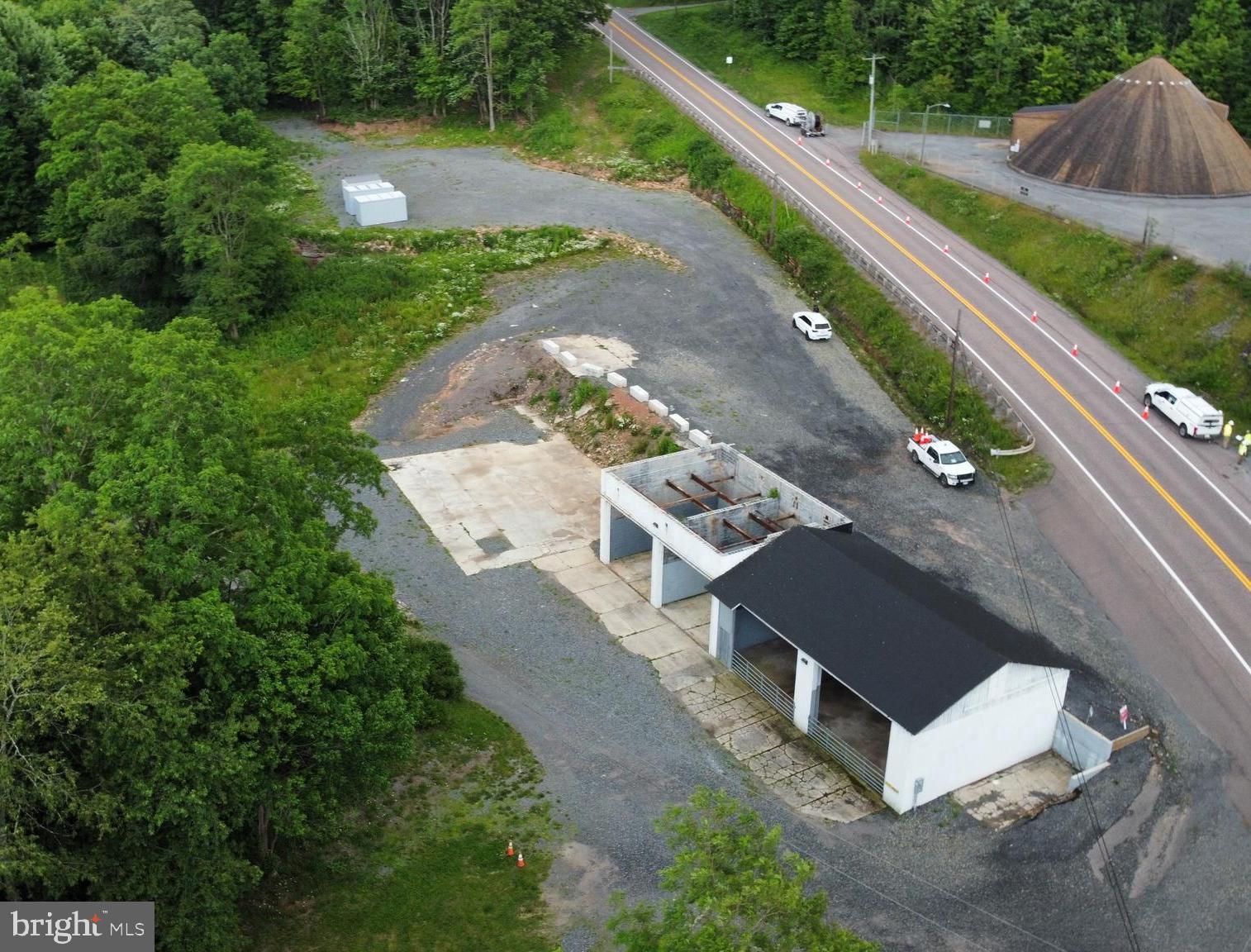 Welcome to 3501 George Washington Highway, a premier property containing 2.86 acres of prime land perfect for personal, or commercial storage purposes. The property features a recently renovated garage with four spacious bays, providing versatility for automotive, storage, or workshop purposes. The large gravel storage lot and concrete pad are ideal for all outdoor storage needs. Two metal storage containers that provide additional protected storage are also included with the property. Situated along George Washington Highway, this property benefits from high visibility and easy access, making it an attractive location for businesses. Contact today to see it yourself!
DISCLOSURE: RAILEY REALTY IS NOT THE CARETAKER OF PROPERTIES LISTED BY IT. DURING INCLEMENT WEATHER CONDITIONS, PROSPECTIVE PURCHASERS AND THEIR AGENTS ASSUME ALL LIABILITY ASSOCIATED WITH OR BY WEATHER AT THE PROPERTY.