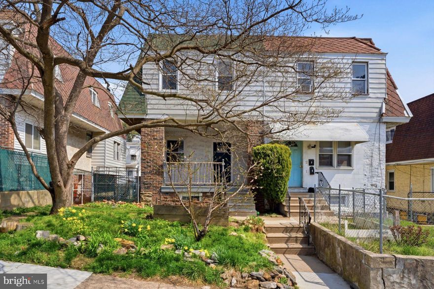 This charming twin home is full of potential and ready for your personal touch. Located in Upper Darby Township, the property offers over 1,300 square feet of living space, plus an unfinished basement with its own entrance - ideal for future finishing. A welcoming front porch leads you into a cozy living room, followed by a separate dining area and a kitchen with an island that provides extra seating. Original hardwood floors add character throughout the home. Outside, you’ll find a side yard that’s perfect for gardening or giving pets some space to roam. Recent updates include replacement windows, a new front door, and kitchen improvements. There’s also a rear garage with an additional parking spot, along with a small back deck just off the kitchen. Upstairs, there are three bedrooms and one full bathroom. The location is a major plus: just a short walk to the 69th Street Transportation Center, making commuting to Center City a breeze. You’ll also enjoy easy access to parks, shopping, and major roadways. With solid bones and plenty of opportunity to make it your own, this home is a great option for both homeowners and investors alike. Property is being sold as-is. The seller will not make any repairs.
