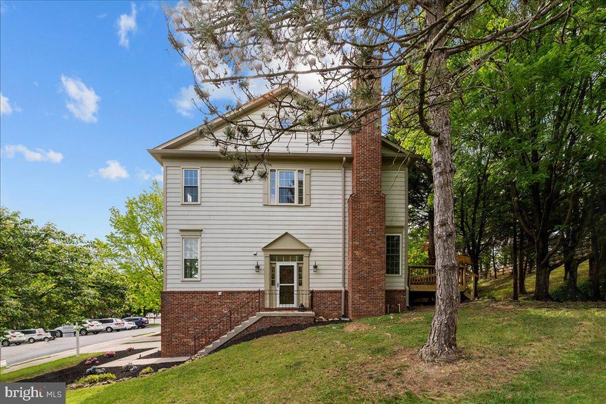 This charming Colonial townhouse in Tavistock Farms offers a perfect blend of comfort and modern living. With 3 spacious bedrooms and 2.5 baths, the interior features an inviting open floor plan, highlighted by luxury vinyl plank flooring and abundant natural light. The kitchen boasts stainless steel appliances, an island, and a cozy breakfast area, ideal for gatherings. Relax in the family room by the wood-burning fireplace or unwind in the luxurious soaking tub. Step outside to enjoy the community amenities, including a community pool and well-maintained common areas. The lot adjoins open space and backs to serene trees, providing a peaceful retreat. With a major "glow-up" just completed, this home is a fantastic investment in a vibrant community. Experience the warmth and comfort of this delightful property, where every detail invites you to create lasting memories.