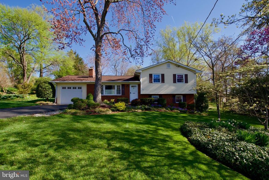 Be sure to watch the virtual tour.  Location location location.  Welcome home to this beautiful home within walking distance to Thomas Jefferson High School.  You will not find a prettier yard anywhere..it is truly spectacular.  Great great curb appeal.  Home features 4 bedrooms and 3 baths.  Freshly painted throughout.  Hardwoods on main and upper levels have been refinished.  The living room is so sunny and bright and has a wood burning fireplace.  The super large kitchen has large hutch at one end that conveys.  Off the kitchen is a wonderful 16' x 24' addition with vaulted ceiling, skylight and lots of windows overlooking the perfectly manicured backyard.  Wicker furniture in addition conveys.  As you walk out of the addition to patio there is a large awning that can be electronically opened and closed.    2 upper level baths have been updated.  Lower level rec room has new flooring and new walls..it has a door to the outside.  Lower level bedroom and fully renovated full bath on lower level.  Roof is brand new.  Heat Pump 2012.  Close to shopping, dining, parks and golf.  Great location inside the beltway with  easy access to 495, 395, 95, 236, Braddock Rd., and Columbia Pike.  Make this your home today!!!