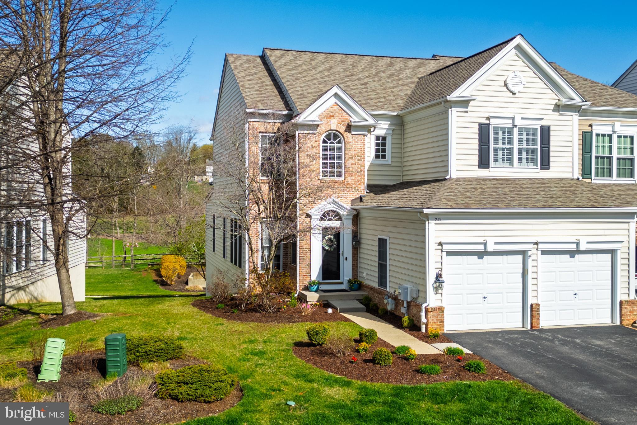 Refined living spaces. Coveted location. Welcome to 721 Mercers Mill Ln, tucked just outside of West Chester Boro. This sophisticated 4 bedroom, 3.5 bath townhome offers an elevated touch to an impressive floorplan which includes formal and informal living and dining, a spacious kitchen, and a standout finished basement. Column details, a half wall, built-ins, custom trim, and a 2-sided gas fireplace are just a few of the details that set this home design apart. Bright, airy rooms, beautiful site lines and architectural detail will let you entertain in style, and your festivities can move seamlessly onto the back deck which enjoys peaceful, nicely landscaped open views. Upstairs, there are 3 bedrooms and 2 full bathrooms including the owner’s suite which offers an expansive retreat with a walk-in closet, dressing area with built-in desk, and en suite bathroom. Downstairs, the finished walkout basement is a retreat in its own right, with the 4th bedroom, full bathroom, great room, and built-in wet bar. The Mercers Mill community offers a low-maintenance lifestyle within walking distance of Everhart Park. West Chester Boro’s shopping and dining scene will be at your fingertips and you’ll have convenient access to Rte 322 and Rte 202. Request a personal tour today!