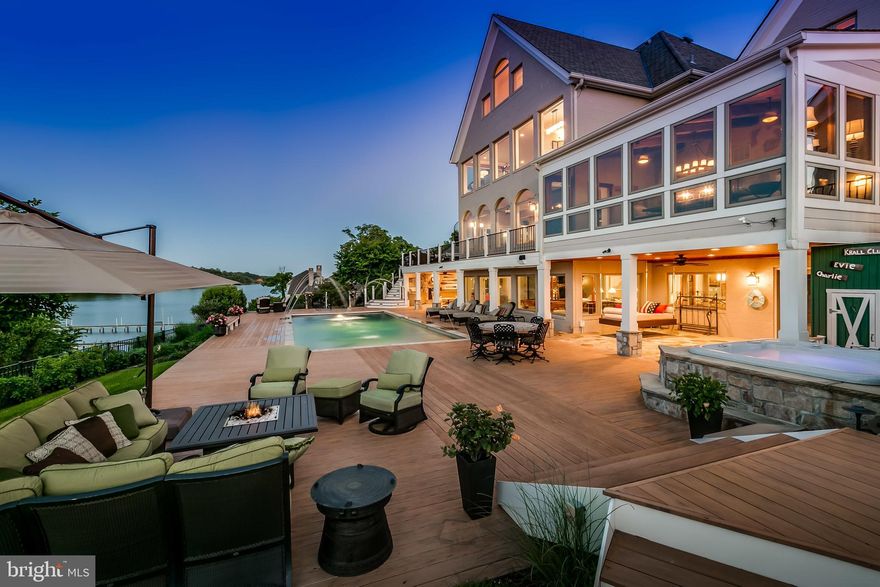 Breathtaking sunrise views of Severn River from this beautiful custom 12,332sqft home exquisitely renovated in 2008. Luxurious features throughout. Lavish mstr suite w/stunning view. Gourmet kit w/2 SubZero's & Wolf range. Coiffured ceilings, 6 fireplaces, theatre, sauna & steam rm. Gorgeous Pebbletech waterside pool, spa, fireplace & fountains. Private deep water pier w/3 slips (2 lifts 12k & 20k)