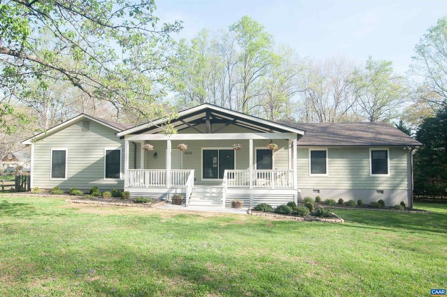 Open and bright one level living located on 2 acres in the appealing Earlysville area, just minutes to Hollymead Town Center, restaurants, shopping and grocery stores. This lovely home has been expanded and updated/ with a large 4th  bedroom or bonus room, half bath & attached 2 car garage with workshop area.. Kitchen improvements include the addition of custom concrete countertops with butcher block inserts, ceramic tile backsplash, ceiling to floor cabinets, walnut bar, and built-in pantry. Solid poplar trim throughout most of the home as well as lovely hardwood floors enhance its beauty. The primary bedroom features "his and her" closets with custom built-ins. A mudroom "locker" is a real plus. The inviting front porch overlooks the large front yard with split rail fencing. The rear deck is great for entertaining. A large shed with electricity offers additional storage, work shop or hobby area.                    nah,Solid Surface Counter