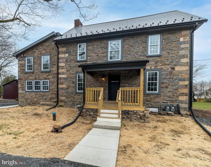 DOYLESTOWN TOWNSHIP FARMHOUSE BEAUTIFULLY RENOVATED INTO 2 APARTMENTS.  Located in the Central Bucks School District just minutes from Doylestown Borough, this 1840 farmhouse has been meticulously converted to 2 apartments with 2 bedrooms, 1 bath, new appliances, windows, paint, flooring - complete attention to detail.  Enter the first floor apartment into an entertainment area and notice the new flooring, paint and how much light comes through the new windows.  Continue to the eat-in kitchen with all new, stainless steel appliances, granite countertops and new cabinets that reflect the cozy, farmhouse character.  To the right of the kitchen is a bedroom filled with lots of light through the windows and the deep window sills.  To the left of the entry is a large bonus room, again with new large windows that allow in so much light and are energy efficient.  Continue through the bonus room to the primary bedroom with continued character.  Connected to the primary bedroom is the new jack-n-jill bath.  Private laundry is located in the upper floor with a brand new washer and dryer for each unit.  This home sits on over 2 acres of land which owner will maintain. Landlord not only maintains property, including lawn maintenance (currently being seeded) and snow removal, but will pay for internet, trash removal and public sewer. Tenant only pays for electric and gas, and separate meters are conveniently set up for each apartment.  2 parking spaces per apartment.  Owner will operate a business on the property, but will use a separate driveway and install a fence.  Sorry, no pets.  No smoking.  First month, last month and security deposit required.  Credit/background check conducted. Available now. Come see this beautiful farmhouse that could be your new home.
