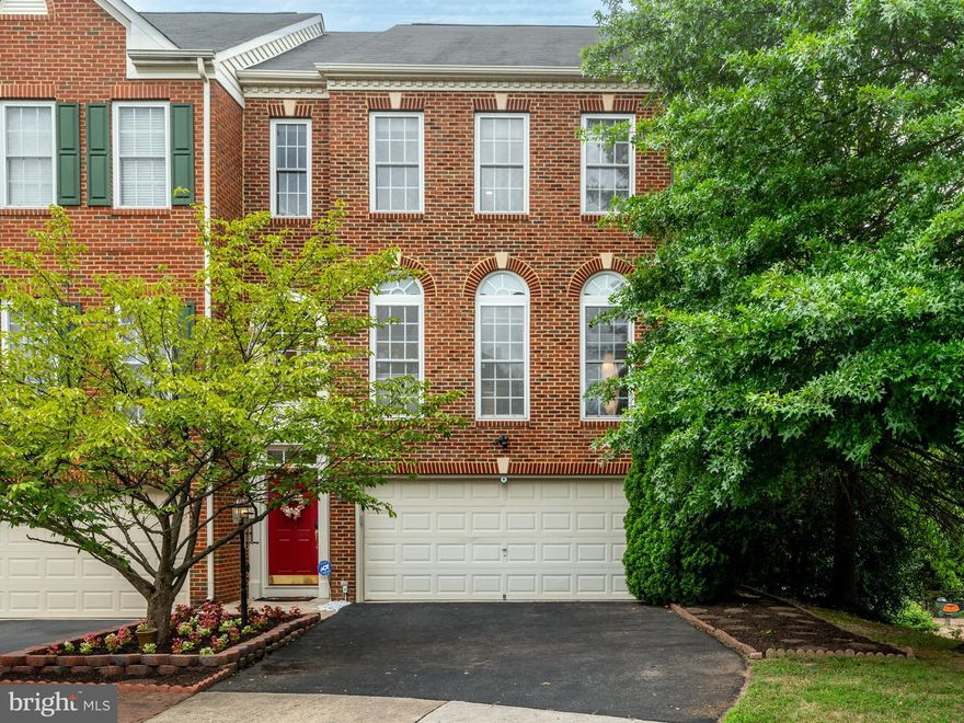 Location!!! Location!!! Location!!! Seeking fabulous two garage end townhouse? Love being tucked away at the rear of the community overlooking common area with no neighbors immediately behind, in front or on the side? Extra parking on your own driveway in addition to the two garage bays preferable? Plus tons of guest and additional parking immediately adjacent very desirable? This is it!!! Fabulous NV Carnegie 3 level brick townhome with four-foot bump-out on each level offering significant additional living space for great ease and flexibility of lifestyle. Gracious entry foyer flows to the sizeable recreation room (with media area for watching major sports events and games area for setting up a pool or ping pong table) which opens onto the patio and fenced rear yard via atrium doors. Full tub bath on this level offers the opportunity to create a guest or in-law suite.  The heart of this home, with its open floor plan, is the main level with three-sided gas log fireplace accenting the dining and living areas, oversize window on two sides creating wonderful light filled ambience. Opening from this large and very flexible space are the kitchen and adjoining family room. The former is top of the line with stainless appliances, granite counter tops, glass block back splash, gas cooking, multiple ovens, pantry, work island, with breakfast bar, and breakfast area—hard to get better than this.  Family room is an integral part of the kitchen so the chef is always part of the action. Convenient powder room nearby. Upper level with absolutely wonderful primary bedroom suite, a true retreat including cathedral ceiling, large bedroom, sitting area, generous sized walk-in closet, luxury bath with whirlpool tub, separate shower, dual sinks. Plus two additional bedrooms as well as hall bath with tub. Commute necessary? This location is ideal with easy access to I95 to commute in to Pentagon, DC, Old Town; just a short distance from Fort Belvoir, NGA, Quantico; or prefer not to drive: VRE station nearby. Among community amenities are a pool, tennis and basketball courts, playground, fitness center and club house and park. Gas heat, hot water and cooking.