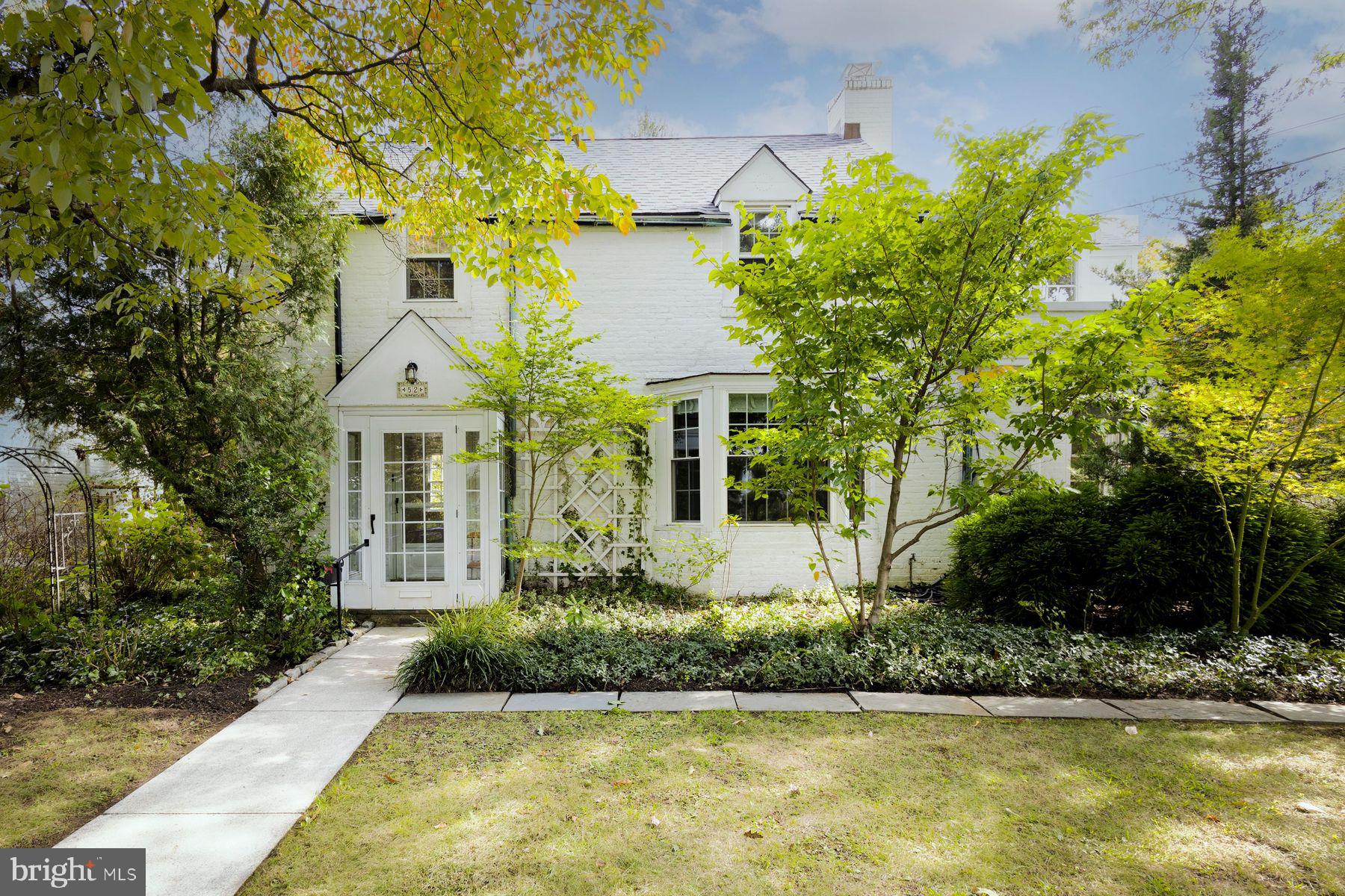 Welcome to 52 Grove — where charm meets downtown walkability & move-in ready ease in one of Flourtown’s most desirable neighborhoods! Step inside to find gleaming wooden floors in the light-filled living room, along with a gas fireplace. The kitchen offers granite countertops, plentiful cabinets and a convenient island, while views of the backyard oasis beckon. A dining room with a bay window invites warm gatherings, while an adjacent den offers more space to relax. Down the hall you'll find a sunny first-floor bedroom suite with double closets and a full bathroom — ideal for a primary suite, guests or in-laws. Upstairs, three bedrooms and a full bathroom greet you, along with a bonus room (currently used as an office) featuring treetop views and abundant natural light. Thoughtful architectural details, including built-in bookshelves, abound. A recently finished basement adds hidden storage and laundry space, along with ample room for playtime and family movie nights, not included in total square footage.
Outside you’ll find a large fenced yard and patio, where a dreamy cherry tree blossoms in the spring and hydrangeas bloom all summer. A detached two-car garage with a gated driveway (perfect for playing!) offers additional parking and storage. Around the corner, the cul-de-sac of College Ave hosts annual street parties, a kids’ Halloween parade and more — another part of what makes this neighborhood so vibrant and special.
The house is an easy stroll to Rita’s, Movie Tavern, Starbucks and restaurants and grocery shops, as well as the Flourtown Farmers Market. Down the street, you'll enjoy access to Ft Washington State Park and Wissahickon trails. Minutes from the train, Blue Rt and Pa Turnpike, with updates including a new roof, hot water heater and boiler, Bosch dishwasher and more. Plus award-winning Springfield Township schools! Move right in and enjoy easy living with an unbeatable combination of walkability, friendly neighbors and proximity to nature.
