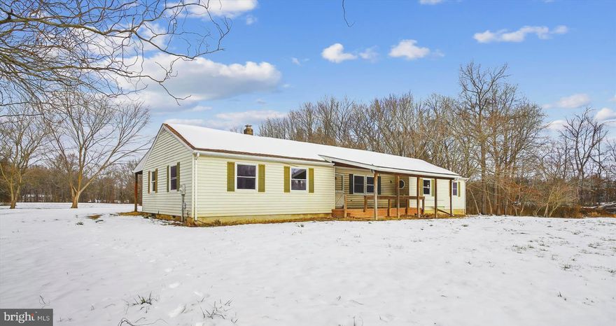 5 ACRES!!!!! MOSTLY PASTURE, some fencing and older outbuilding (stable/pole) Electric & water,  Shed/chicken coop.
The home is approximately 2000 sf and offers spacious open living area!! Kitchen can be renovated to satisfy any chef, him or her!!!   master bedroom and bath at opposite side of home from the second and third bedrooms.  Covered front porch looking out over the front pasture.  Home is in need of updating, depends on 
your taste and your budget.....serenity, peace and quiet.....
EASY access to #213 , and 301,, North or South, & Rt. 50