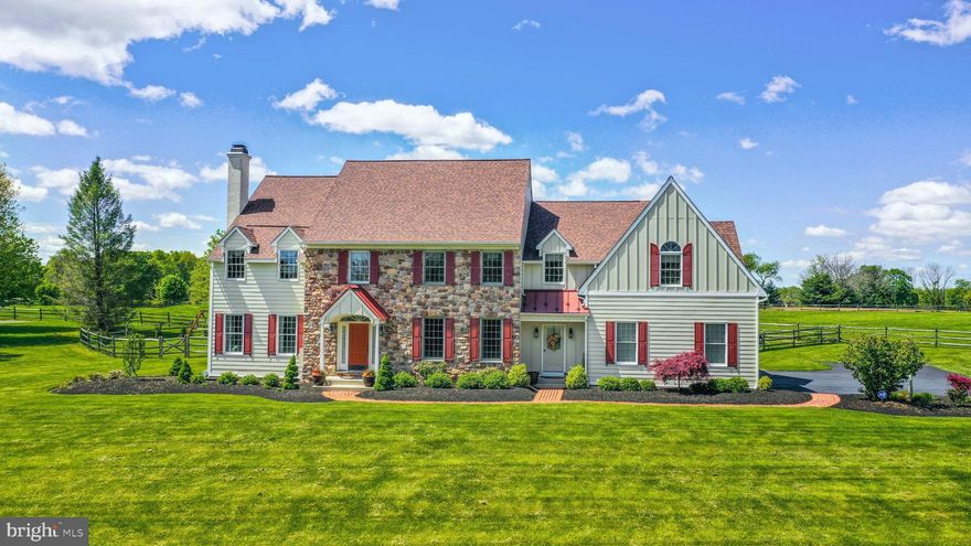A quiet country road in Buckingham Township is the setting for this spacious home. Resting on over 2 acres and nestled against farmland, Pineville Manor is the perfect blend of rural charm and modern amenities.

Wide open skies provide the backdrop for this stunning colonial. Red oak floors are warm and welcoming, while high ceilings and plentiful windows provide plenty of light. Nearly every room has been upgraded in recent years, including gas fireplace inserts in living and family rooms, sparkling light fixtures, and custom tile accents. Formal living and dining rooms flank the 2-story foyer, with a nearby office framed by two sets of French doors. The large kitchen with gleaming stainless appliances flows easily into the breakfast area and family room. A butler’s pantry, laundry/mudroom, and half bath complete this level. Upstairs, the landing is wide enough to accommodate a cozy sitting area. The primary suite is luxurious with multiple walk-in closets and an en suite bath with jetted tub. Three more generously sized bedrooms along with a hall bath are found on this level. 

Perfectly positioned to take advantage of its natural surroundings, Pineville Manor is located in the highly regarded Central Bucks school district, and is close to shopping and dining opportunities in Buckingham, New Hope and Doylestown.