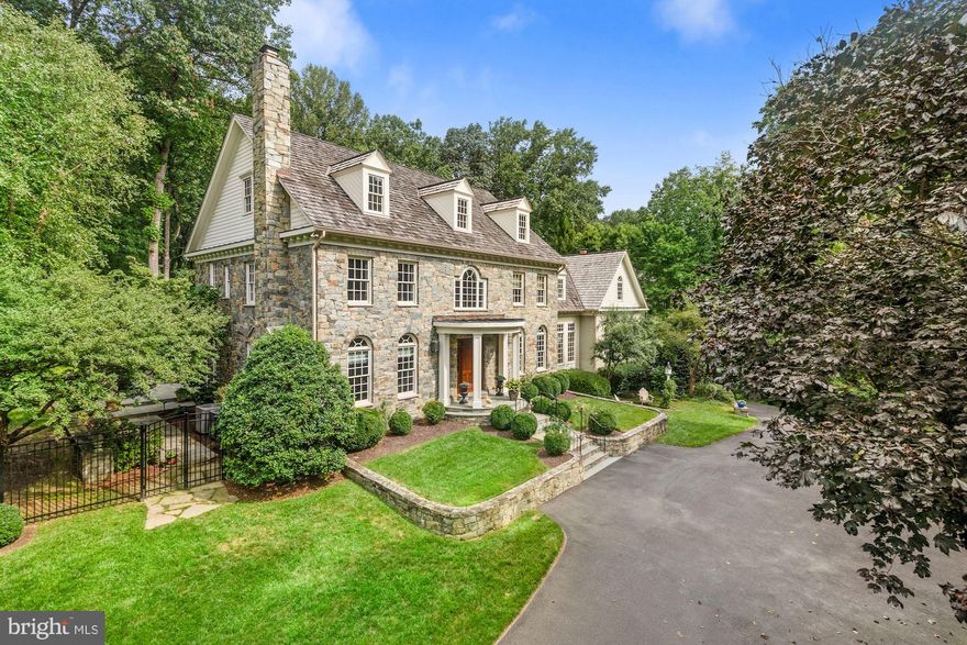 JUST LISTED! HANDSOME AND TASTEFUL STONE AND BRICK GEORGIAN STYLE HOME ON 2 ACRES WITH FULL HOUSE GENERATOR, UNDERGROUND SPRINKLER SYSTEM, FENCED REAR GARDEN, TERRACE WITH FIREPLACE, EMBASSY SIZED LIVING ROOM, LIBRARY AND OFFICE, 5 BEDROOMS, 5 FULL + 2 HALF BATHROOMS, 2 CAR GARAGE WITH ROOM FOR 3RD CAR, KITCHEN WITH ALL STAINLESS APPLIANCES, WALK-OUT LOWER LEVEL, RECREATION ROOM, WORKOUT ROOM, CRAFT ROOM ETC.  A MUST SEE FOR GRACIOUS LIVING - AND MINUTES TO DC, TYSONS AND ALL POINTS IN MARYLAND.