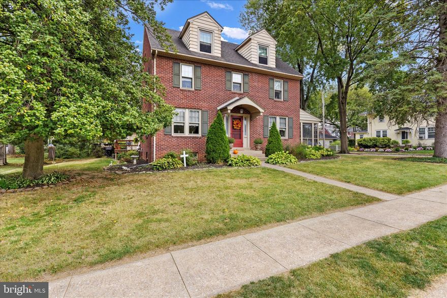 Step inside this timeless 1942 brick beauty in the heart of York Suburban School District — where classic character and modern updates blend seamlessly across three spacious stories.

From the moment you enter the slate-floored foyer, you’ll feel the craftsmanship. The oversized living room steals the show with hardwood floors, a cozy fireplace, and direct access to a dreamy screened-in porch. Hosting? The elegant formal dining room with a built-in corner cabinet sets the perfect tone.

The kitchen shines with white cabinetry, hardwood floors, and a convenient pass-through to the den — ideal for entertaining. The den opens right out onto the deck, with easy access to the driveway and oversized 2-car garage. A tucked-away main-floor half bath adds convenience.

Upstairs, the spacious primary suite features its own private bath and dressing area. Two additional bedrooms and another full bath complete the second floor, while the third floor flex space is perfect for a studio, guest suite, or creative hideaway.

The partially finished basement offers even more usable space — perfect for movie nights, a playroom, gym, or hobby room — plus tons of storage to keep everything organized.