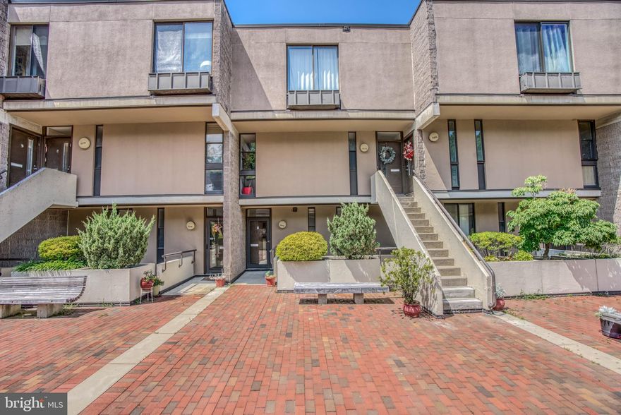 Designed by the renowned architect, Moshe Safdie in the early 80s, Coldspring Newton was a development ahead of its time. Almost 40 years later, this lovely, modern neighborhood  has finally come into its own. Thoughtfully and lovingly renovated by it's current owner, this home is a love letter to its new buyer. There are so many thoughtful touches through out every room and every floor. The four full levels of living are spacious and light filled. Main floor has a huge living room, dining space, smart, Eco- friendly laminate floors, clean, crisp lines, recessed lighting, gorgeous chandelier, bright open kitchen with butcher block counter on peninsula/breakfast bar and KitchenAid appliances. Don't miss the pantry/laundry room tucked away for maximum function and space saving. The 2nd floor has a full bathroom with gorgeous custom tile work and the first of four bedrooms with great built in closets. Top floor has two more bedrooms, one of which is the master bedroom with walk-in closet and a stylish en suite bathroom with double sinks, and soaking tub. The lower floor is fully finished with a family room, amazing full bathroom and large bedroom with walk in closet.  As a bonus, owner has had a rough in for a kitchenette so this floor could easily be converted into a separate in-law or au-pair suite. The lower level has a mini-split units to ensure a comfortable climate all year long. Last but certainly not least is the sweet backyard oasis with new deck. Other updates include replacement of many windows and new HVAC just to name a few of the numerous improvements. This unit is among the largest in the development and has TWO parking space (tandem).The community also has several parks, a playground, many walking paths and a pool. As an extra bonus nature lovers: The Jones Falls  Trailhead is located across from the garage!  Additionally, Coldspirng Newton residents get a 10% discount on their tuition for The Waldorf School which is located directly across the street! This is a rare offering.**Please note that the condo fee is a combination of the condo fee and the HOA fee together and includes water**.