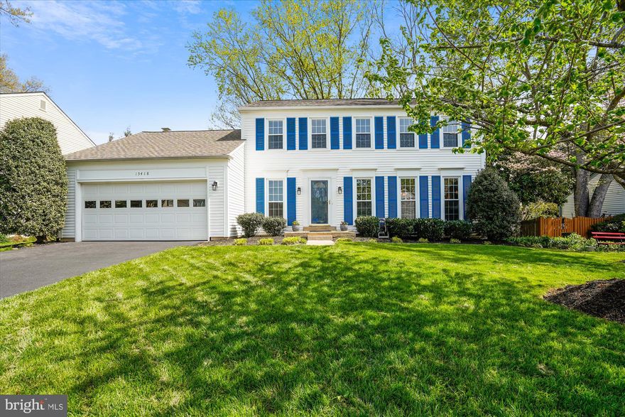 Gorgeous curb appeal! Welcome home to this 4 Bedroom/2.5 Bathroom home in Poplar Tree Estates!  This home has been lovingly maintained and it shows! The main level has a large formal living room with loads of sunlight and a formal dining room with updated lighting and a view to the back yard. The kitchen has been updated with granite counters and stainless steel appliances (a gas range!) and an eat-in area.  The family room is cozy with an all brick hearth and a sliding door out to the LARGE backyard. This yard is just perfect - flat lot and fully fenced! Upstairs features four bedrooms. The primary bedroom has a large walk-in closet and an en suite updated bathroom. The additional three bedrooms share an updated hall bathroom.  The entire upstairs and stairway have brand new carpet (April 2025).  The lower level is unfinished and ready for your design and ideas!  ALSO - the path to Rocky Run Middle School is just steps from the front door! 
 IMPROVEMENTS INCLUDE - New Driveway (2022), Washer (2022), Dryer (2020), Three Bathroom Remodels (2017), Dishwasher (2017) Gas Range (2016), Architectural Asphalt Shingle Roof (2015) Water Heater (2011), HVAC (2010), Newer Garage Door.