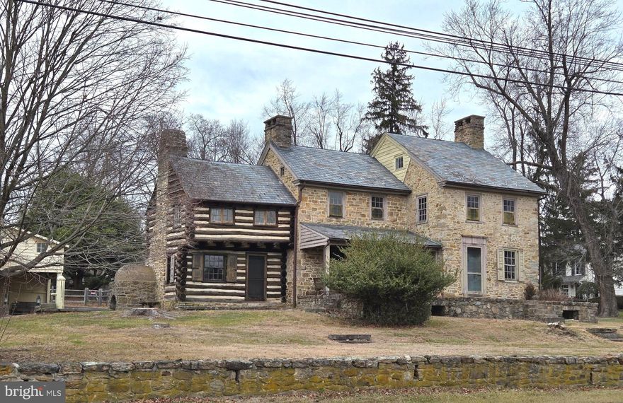 Historic, solidly built log and stone house with slate roofs  has many original details that confirm its provenance to 1760. It’s not a move-in ready house but its potential, after extensive renovations, will create an exceptional and distinctive home. Seldom do you find a property of this vintage that is in the shape this one is in with usable wide plank flooring, massive doors, and iron hardware contributing to its ambiance. Four fireplaces on the main floor, one of which is in the original log cabin room and is a walk-in fireplace with a beehive oven rarely seen intact. Take a moment to look at the log construction and the beams built 286 years ago! A large living room with a wonderful staircase to upstairs and a separate dining room each have a fireplace and doors to outside patios. In the dining room are massive doors that when open reveal where the kitchen was. It too has a fireplace! From the driveway there is an entry room that was once the kitchen but now could be used as a mudroom, laundry area, and closet area. A half bathroom is next to it. The second floor can be remodeled to suit your needs and offers a full bathroom and two or three bedrooms. One  incorporates the area above the original log room with a back staircase.   Another graceful staircase brings you to the third floor that could become a bedroom or multi-purpose room. The almost one acre property, the rear part of which is fenced, also focuses on outdoor living.  Many doors, some Dutch style, take you to a wide brick area across the front of the house and to a covered sitting area. In the rear is a large paver  patio, a built-in stone grill, a huge concrete swimming pool and a two story circular stone tower with the well and a wooden water storage tank above. There is no functional kitchen in the house now, but the discerning buyer that transforms this property into a showplace of old world charm and modern amenities will own and live in a very special home. Now a diamond in the rough. The separate barn/garage offers another solid building of opportunity with 3 garages, 2 rooms on the second level   and one (18'x18') filled with natural light from a huge skylight and windows overlooking the preserved farm across the road.  What a view! The other is 25'by30' for storage. Here are two well-constructed stone and frame buildings on almost one acre of land ready for renovating.. Come fall in love with what is there, what it offers, and what it could become. If you have vision, a love of preserving antiquity and history, and want to design a home and lifestyle that suits your dreams and needs, this property is a must-see. Near Doylestown, Peddler’s Village, New Hope, and their incredible restaurants, shops and stores, entertainment venues, parks and access to commuting routes to Philadelphia and New York, the location is a wonderful one. Come take a look and fall in love.