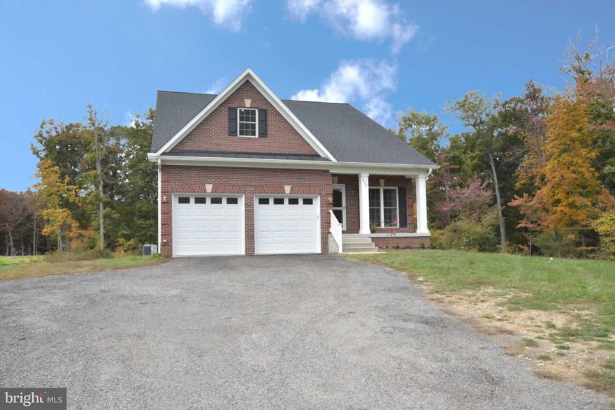 Move in ready. Great for single-level living. Beautiful 4 bedroom/3 full bath single family detached home on a 5.43 acres lot. Three bedrooms on the main level, including a large Master Suite with tray ceiling.   One bedroom loft on second level with large storage area that can be easily converted to your future home office.  Upgraded kitchen countertops and bathroom vanities with Quartz. The entire home is wood floored and open style with abundant natural lighting.  A huge basement with preinstalled plumbing available for your future imagination.  Surrounded by woods and spacious backyard. Ask your agent to schedule a showing soon before it's too late.