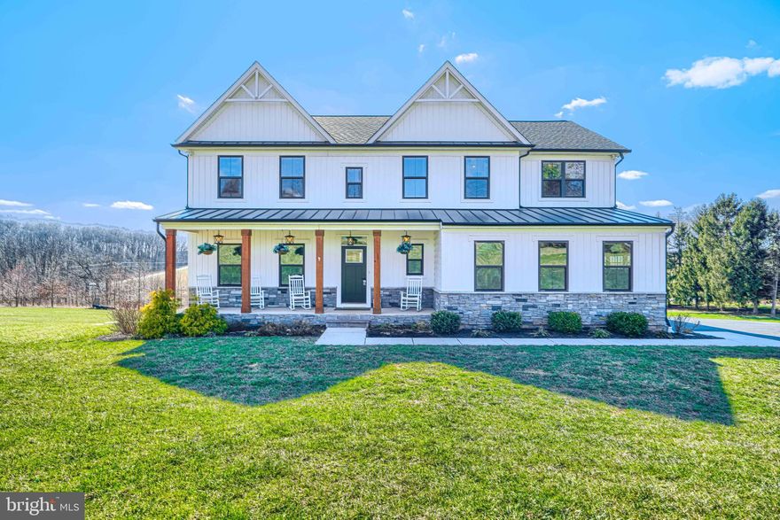 Custom built in 2020 on 5.976+- acres. Front & rear covered porches, Lincoln oak engineered wood floors, Gas stone fireplace with mantle in great room, center island with quartz counter tops in the kitchen with 42" cabinets, loft on the second level could be the 5th bedroom,  craftsman window trim around all windows, Custom moldings throughout, 1000 gallon propane tank, Upgraded monogram SS appliances, insulated ceilings for sound proofing, standing seam metal roof, front & rear porch, Gas HVAC is dual fuel, rear storage shed with barn doors & rough in for hot tub,  8' high garage door, car charging rough in outlet in garage, 3 ring security motion sensor lights with cameras. No HOA. Professional photographs coming soon.