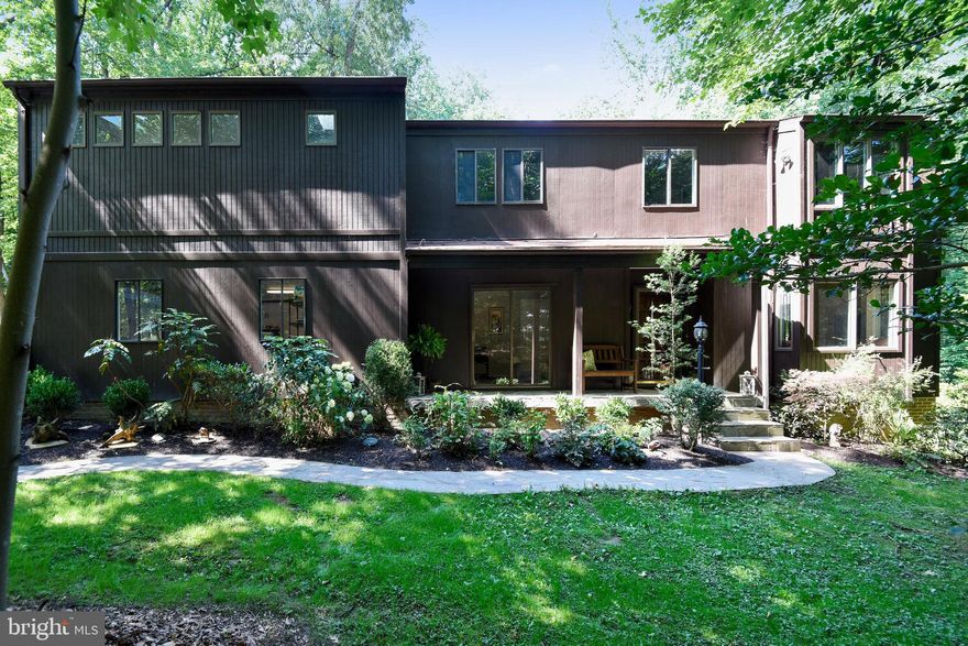 Celebrate 2020 with purchasing this fabulous home in the heart of Great Falls... A beautiful home that is in the Langley School Pyramid...You will love, love, love this unique contemporary Great Falls home both inside and out.... Perfectly sited on .94 acres, 4 bed/3.5 full baths, approx. 4400+ total sq. ft, finished lower level w/exercise area. The overall floor plan accommodates a warm and welcoming flow whether relaxing or entertaining.  Gorgeous Kitchen renovations feature a stunning fireplace, tons of cherry cabinets, granite counters, stainless appliances, under counter lighting, fun listello accent various areas, stained glass window seat area perfect for morning coffee.   Floor to ceiling stone wood-burning fireplace in the living room will provide the perfect ambiance on a chilly day. Wonderful windows & skylights allow you to enjoy the best of both worlds admiring the trees as well as sunlight.  The Dining Room is ready and waiting for your first family celebration. If you telecommute for work, the office on the main level will definitely accommodate the need for privacy.  The Mid-Level Family Room features built-in cabinetry and the best space for reading or cheering for your favorite sports team . Go Redskins, Nats, Caps & Wizards  Take advantage of the initial Master with updated ensuite Full Bath . PLUS the Beautiful Master Retreat Addition.  You will not believe it until you see it.... the numerous windows, skylights, sitting area, hardwoods, Master Bath's gorgeous glass tile, you will never want to leave....The lower level accommodates an exercise, recreation/game, and 2 storage areas.  Look forward to inviting your friends and family over to celebrate your first cookout or dinner party in your new home....  The floorplan will promote fun for all... The character and charm set this home well above the rest... Not a cookie-cutter home or community.  Approx 2 minute walking distance to either Riverbend or Great Falls Park (you can hear the falls outside at night), your own private sanctuary, fabulous outdoor living spaces to include a spacious deck with pergola, screened gazebo and stone patio. There is room for a pool if you have that interest. Approx. 5 minutes to Great Falls Village, Approx. 15 minutes to McLean/Tysons or Reston, Approx. 30 - 40 minutes to Bethesda or DC depending on the time of day.  Access to the Metro Silverline will be a breeze based on your Great Falls location..McLean, Spring Hills, Tysons Corner as examples. Call to tour and experience all the features this home has to offer .. You will not be disappointed .