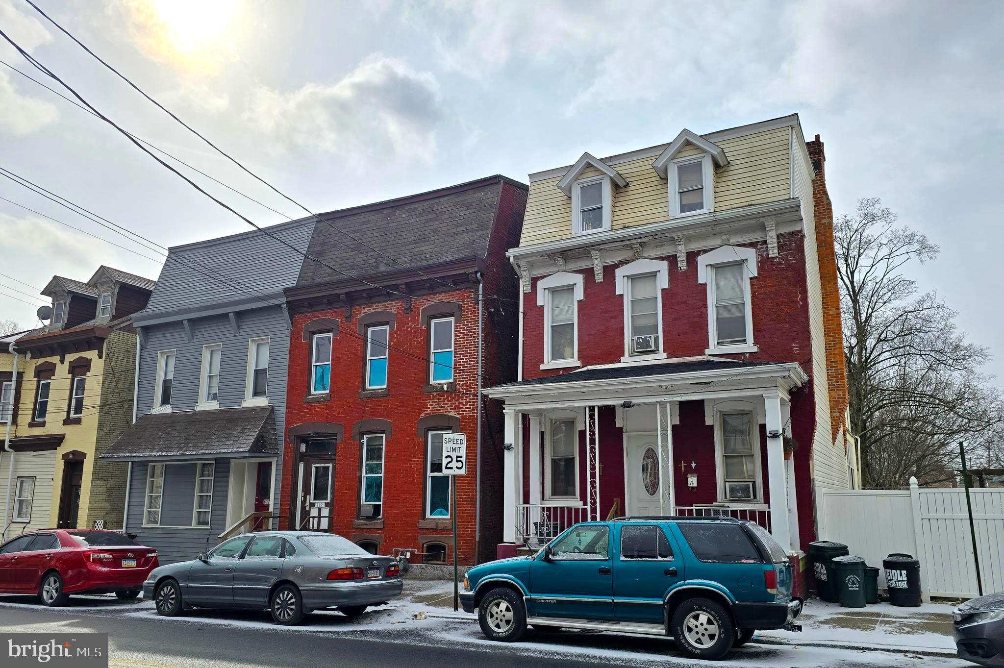 A great opportunity to own this solid brick, 2 unit house with the convenience of off street parking in the back, a covered porch on one side, and a lawn area.
Three separate electric meters are on the building and a natural gas furnace and water heater services both units.
The units are split between first and second floor.
The first floor has a comfortable living room in the front which leads to the kitchen area. The room after the kitchen is used as a walk-through den/bedroom which leads to the bathroom and main private bedroom.
The second floor unit has a large front bedroom, and then an open kitchen/dining area which leads to the living room, bathroom, and second bedroom.
The tenants take good care of their space so please respect their area while doing walk-through showings.
Thanks!