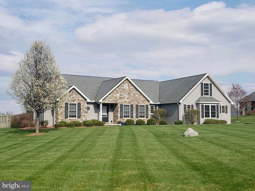 OFFERS DUE BY Thursday 2/2/23 @ 7pm An absolute GEM!  Lovely, inviting, well-built ranch home on level 1 acre lot in the highly desired Reedsville countryside with mountain & valley views.  Open airy concept layout with hardwood floors throughout main living area PLUS a cozy stone propane fireplace & vaulted ceiling.  Currently 3 bedrooms 2.5 baths with the option of adding much more finished living space (bonus room above garage ? over 700 sq feet)   Ample sunlight pours through the many large windows.  The primary suite is very generous in size & amenities.  Inviting custom kitchen has no shortage of cabinets plus a pantry.  Granite counter tops & island complete the look.  Main floor laundry room.  Newer HVAC system plus rear fence around the back yard in the last year. Another recent upgrade were 2 charging stations installed professionally in the garage for electric vehicles.  This home really checks off all the boxes ? must see to appreciate all it has to offer.