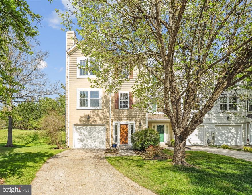 Located in the popular Village of Dorsey’s Search, this end unit townhome is especially spacious with generously sized rooms on all 3 finished levels, and has an ideal location backing to the golf course.  Upon entering the home, you will find ceramic tile flooring in the foyer entry with convenient access to the attached garage, and beautiful new LVP flooring stretching into the finished lower level family room with the first of this home’s three fireplaces, as well as a walkout slider to the private rear yard.  The main level provides an expansive and updated kitchen with granite counters, granite island, modern updated light fixture, abundant cabinetry providing plenty of storage, large pantry, eat-in space with room for a large table, and slider to the rear deck with peaceful treed views.  The open concept dining and living rooms have gleaming hardwood flooring, a second wood burning fireplace, and the end unit extra windows make the entire space light-filled.  The beautiful hardwood floors continue on the upper level and are found in all 3 bedrooms.  The primary bedroom is spacious with vaulted ceilings and is anchored by a third fireplace, this one with modern tile surround.  The primary bathroom features a large vanity, oversized corner soaking tub, separate shower, and updated 12” ceramic tile flooring.  Two additional bedrooms also with hardwood flooring, and a second full bath complete the upper level.  Additionally, this home has fresh modern paint throughout, replaced roof, replaced windows, and a cozy fireplace on every level!  The ideal location in the heart of Columbia, and sited on the Fairway golf course!