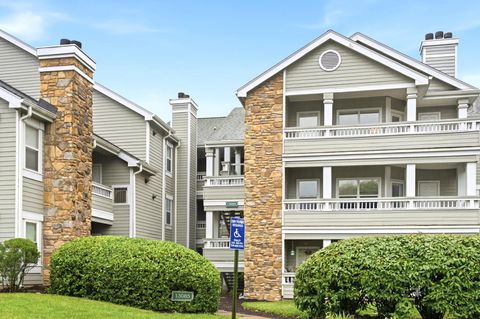 Photo of 13085 Autumn Woods Way #105, FAIRFAX, VA 22033 (MLS # VAFX2318754)