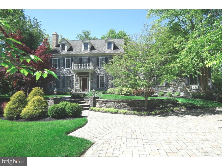 Incredible opportunity to own an exceptional custom home nestled away in a quiet,sought after neighborhood in Lower Gwynedd. This impeccable 5 bedroom 4.5 bath residence is the ultimate haven for graceful living and outdoor entertaining. With stunning curb appeal, this stately stone and new Hardie Board clad Georgian style home with extensive hardscaping and mature plantings, beckons. Upon entry, you will find over 5300 sq.ft. of detailed craftsmanship, where every inch of this elegant and welcoming home is impeccably maintained. The attention to detail is evident throughout, with exquisite moldings, tray ceilings, dark hardwood floors and plantation shutters. Easy living begins with the open layout of the first floor which includes a formal living room, dining room and a gourmet kitchen that offers every convenience, including granite counters, double ovens and a new Viking refrigerator. Ideal for entertaining, the sunlit family room with a dramatic two story stone fireplace will be the center of family gatherings and entertaining. A first floor bedroom with its own private bath offers a comfortable retreat for guests, or can easily be used as an office or library. Main and rear staircases ascend to the second level where four sizable bedrooms await. The sumptuous master suite is flanked by a luxurious dressing area and intimate sitting room on one side, and a spa-like ensuite bath, with whirlpool tub and frameless glass shower on the other. With expansive unfinished areas in the basement and top floor, there are infinite possibilities for an additional 3200 sq ft of living space! Once outside, relax in style on your EP Henry patio; a secluded oasis that includes a magnificent outdoor stone fireplace and walls, built-in grill and sparkling pool with hot tub. The grounds are a lush and peaceful enclave, and include extensive hardscaping and mature plantings. Move right in and enjoy this impressive home and stunning property while being only minutes from trains, shopping, and award winning Wissahickon schools!