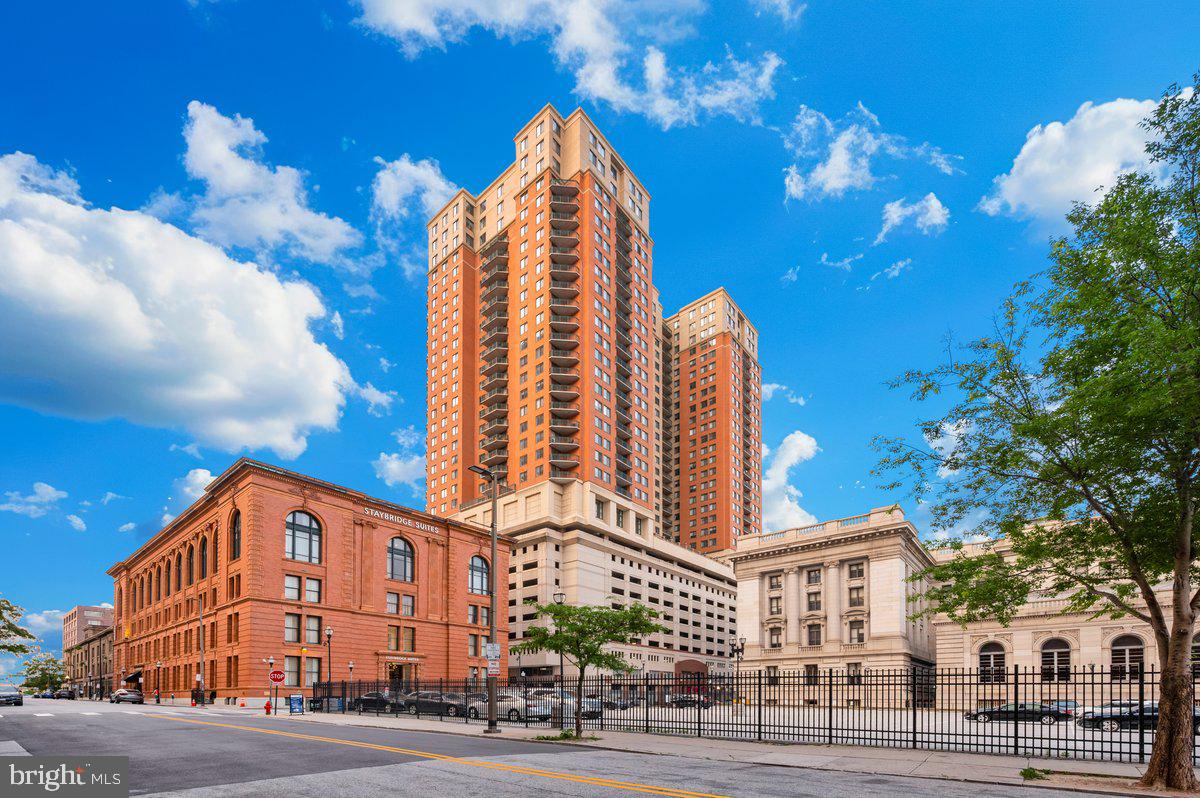 Discover the best of urban living in this high-rise condominium, ideally located in the heart of the city. With shopping, dining, and entertainment just steps away, convenience is at your doorstep.
The building offers a secure lobby with concierge service, a lounge area, and a package center. Residents enjoy access to a range of amenities, pool, a fitness center, business center, and multiple entertainment spaces. The party and game rooms—complete with a pool table, entertainment center, gas fireplace, and full kitchen—are perfect for gatherings. Reserved garage parking is included.
This 2-bedroom, 1-bath unit offers a spacious layout and great natural light. While the home could benefit from some updates, it features high ceilings, hardwood floors, and a private balcony with impressive city views. The kitchen includes stainless steel appliances, granite countertops, and plenty of cabinet space.
The primary bedroom features a walk-in closet, and the second bedroom adds versatility for guests, an office, or additional living space. A full bath and in-unit laundry hookups round out the floor plan.
FHA loan with a 3.875% interest rate may be assumable to qualified buyers.