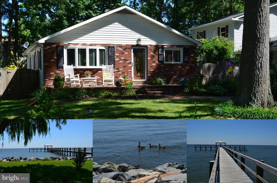 Welcome to your Beach House! Just 2 blocks to the Water! Lots of updates in this "Coastal Living" style home. Open floor plan, updated kitchen, wainscoting, charming lighting, hardwood floors, brick patio with vine covered arbor, more! The over-sized yard has lovely landscaping and lots of places to relax! Front deck,brick pathways,large concrete driveway, 2 storage sheds! Great water amenities!!