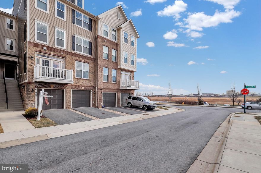 Welcome to this beautiful garage townhome in the highly desirable Jefferson Place! Freshly painted throughout, this home is move-in ready. The stunning kitchen features granite countertops, stainless steel appliances, a 5-burner gas range, and a custom decorative tile accent wall. The open floor plan includes engineered hardwood floors throughout the main level, and a private balcony off the family room—perfect for relaxing or entertaining. The spacious owner's suite boasts a tray ceiling, a huge walk-in closet, and upgraded tile in the bathroom. There are two additional bedrooms and a full bath on the second level provides extra space! Light filled throughout! Conveniently located just off Rt 15. This is a must-see home!