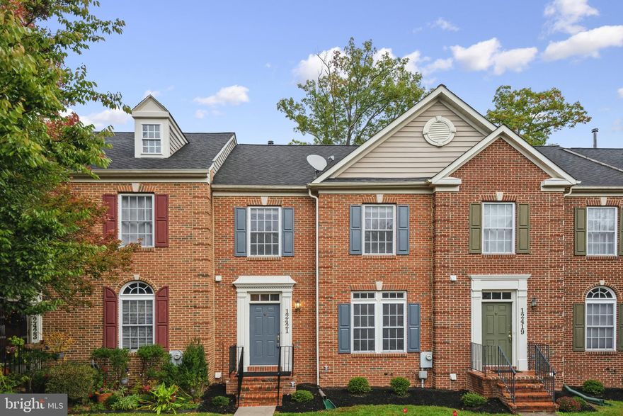 This recently updated spacious townhouse is ready for immediate occupancy and features over 3000 square feet of finished space about 2100 sq ft  on the upper two levels.  The master Bedroom is huge with large bath room.  New gleaming hardwood flooring on upper level and main level. It has a large deck overlooking open spaces and nice view.  The lower level has a huge rec room and a den/bedroom with a full bath and has a nice patio.