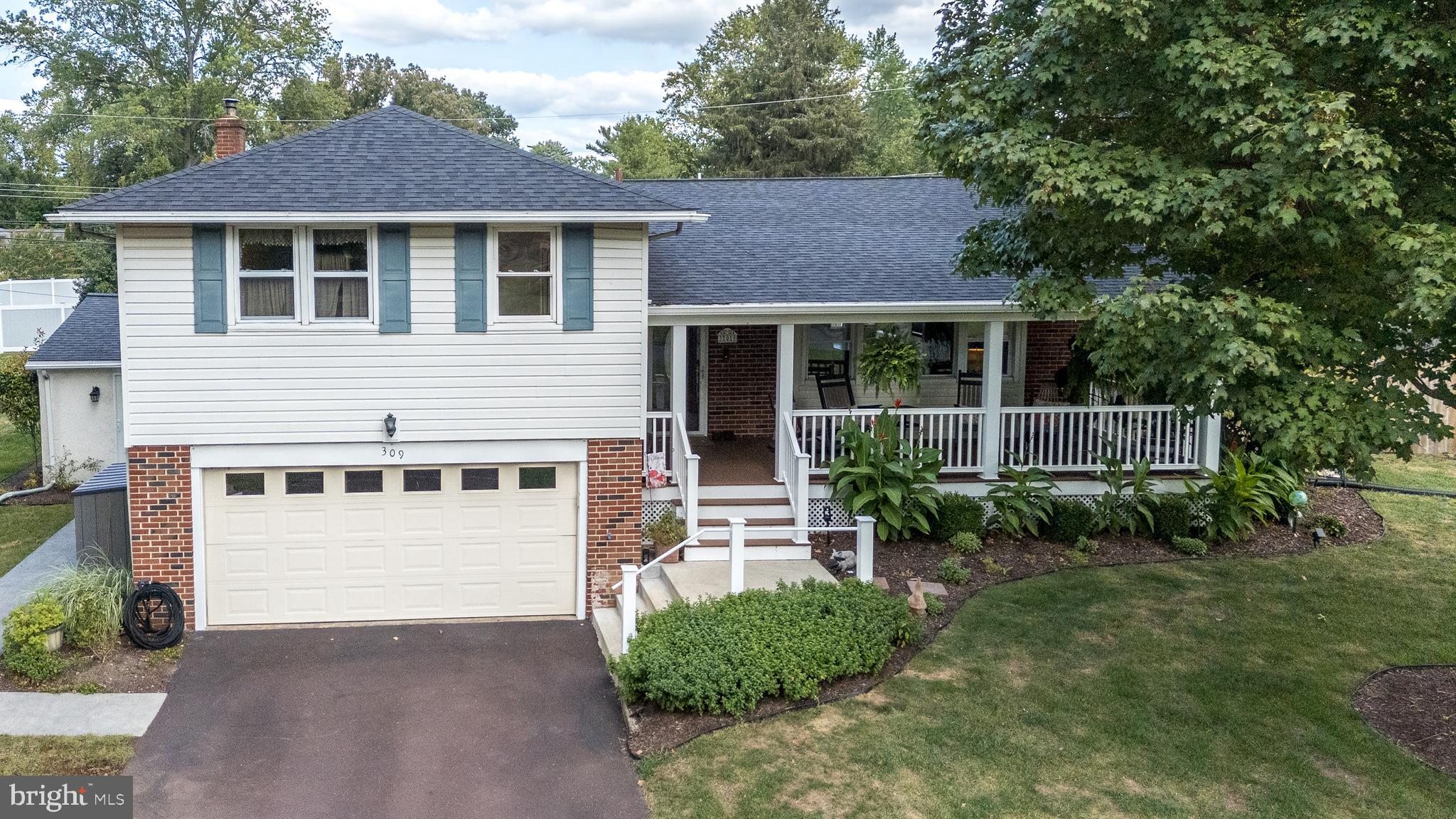This beautifully maintained, welcoming home in the Wissahickon SD will make your heart skip a beat. Set on a generous .7 acre parcel, from every angle inside and out, you'll appreciate the beautiful, sun-filled setting. An wonderful front porch was added along with a new roof adding a perfect place for your morning coffee. Beautiful hardwood floors run throughout the first and second floors. Large picture windows accent the living room, dining room and kitchen making every space bright. Upstairs are three bedrooms. The primary is en-suite with a walk in closet. The second and third bedrooms share an updated full bathroom. Two additional hall closets will keep you organized. Down a few stairs brings you to the lower level. Here you'll enjoy the large family room with cozy fireplace, and an awesome sunroom/recreation room addition to make entertaining even better. A powder room and work out area are here too. Walk out to the backyard, which is beautifully landscaped around the in-ground pool which will offer endless fun all summer long. There is an additional, large side-yard on the other side of the fence with a large convenient shed. The laundry room, along with plenty of storage is in the basement, just a few steps down from the family room. This is a very special home that is ready for the next family to make wonderful memories in. It's located in the top ranked Wissahickon School District, near great shopping, restaurants and easy access to the turnpike. Make your appointment soon, this home won't last!
