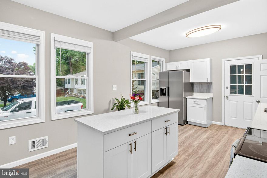 Updated 3-bedroom, 2-bath single-family home in Baltimore County’s sought-after Sparrows Point community! This beautifully brick Cape Cod features stylish finishes, a functional layout, and the space you need to live, work, and entertain comfortably. Step inside to an open-concept main level featuring a spacious living room, dining area, and gourmet kitchen complete with a large island, quartz countertops, stainless steel appliances, and ample cabinet space. Just off the kitchen, enjoy spacious versatile mudroom and step out onto the new upper and lower deck overlooking the generously sized backyard.
The main level also offers a large bedroom and an updated full bathroom. Upstairs, you’ll find a second bedroom accessible through a convenient walk-through bonus room —perfect for working from home or creating a cozy sitting area. The finished lower level includes a third bedroom, family room, laundry area, and additional storage space.
Outside, the private driveway provides parking for two vehicles and includes a NEMA 14-50 (240V, 50-amp) outlet for convenient EV charging. The expansive fenced backyard is ideal for summer entertaining, and the oversized shed offers even more storage and convenience.
Ideally located near outdoor recreation, such as, hiking trails, beach, fishing, a walkable pier and waterfront dining. Approximately 1 mile from North Point State Park, 1.5 miles from Sparrows Point Park, with a newly updated sports facilities, waterfront access,  large playground and nearby Bear Creek Marina. Convenient access to North Point Rd (MD-151) and I-695 makes commuting easy.
Schedule your showing today—this one won’t last long!